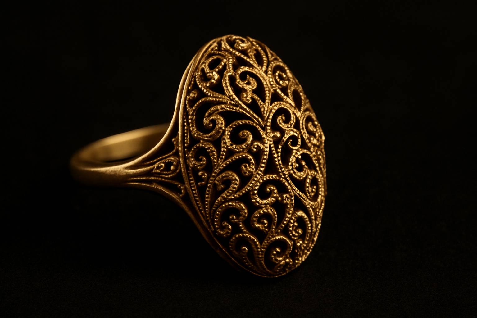 detailed close-up of intricate filigree work on a vintage ring, showcasing expert craftsmanship