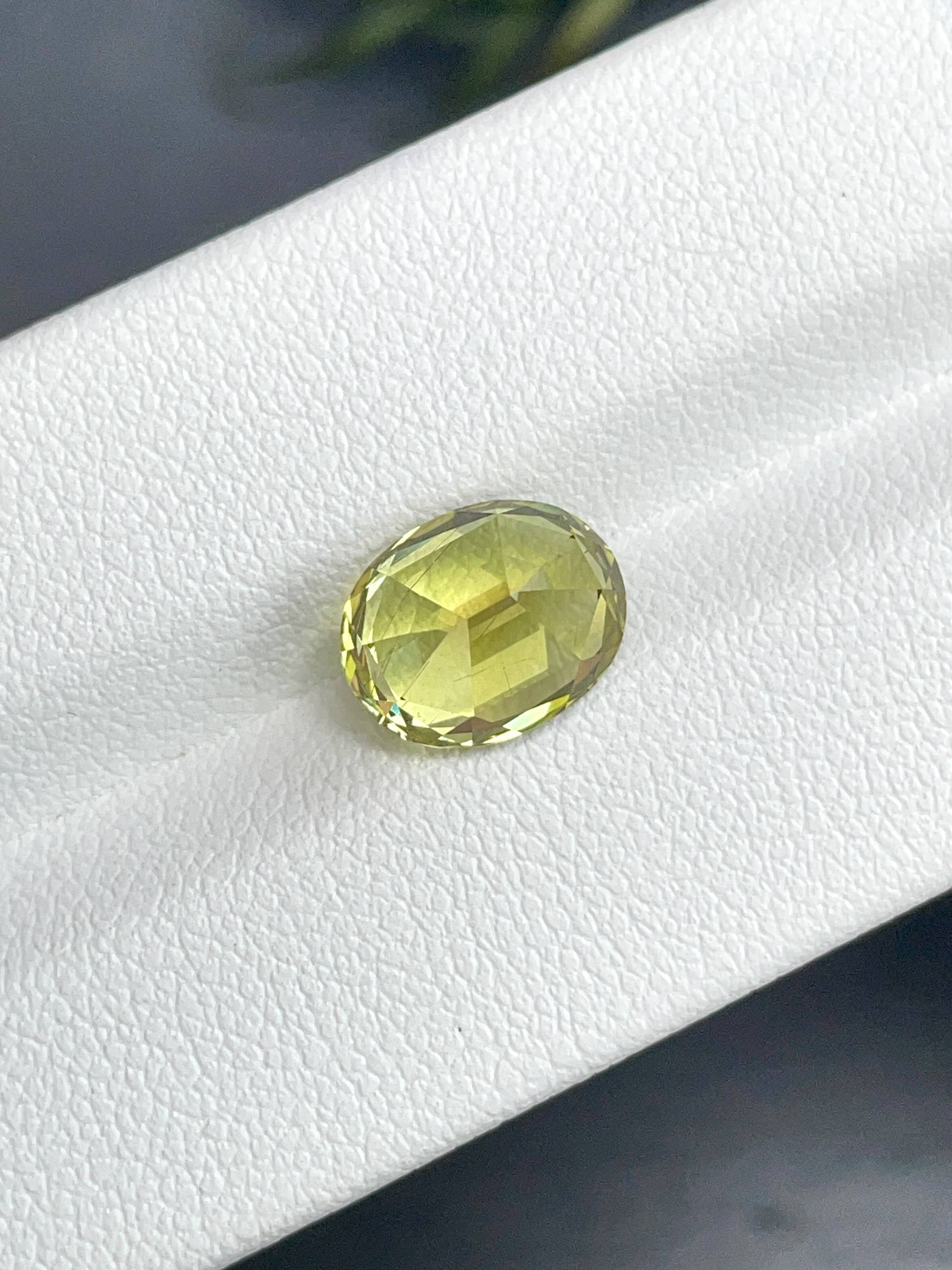 lemon yellow chrysoberyl, 3.99ct oval cut — view 6