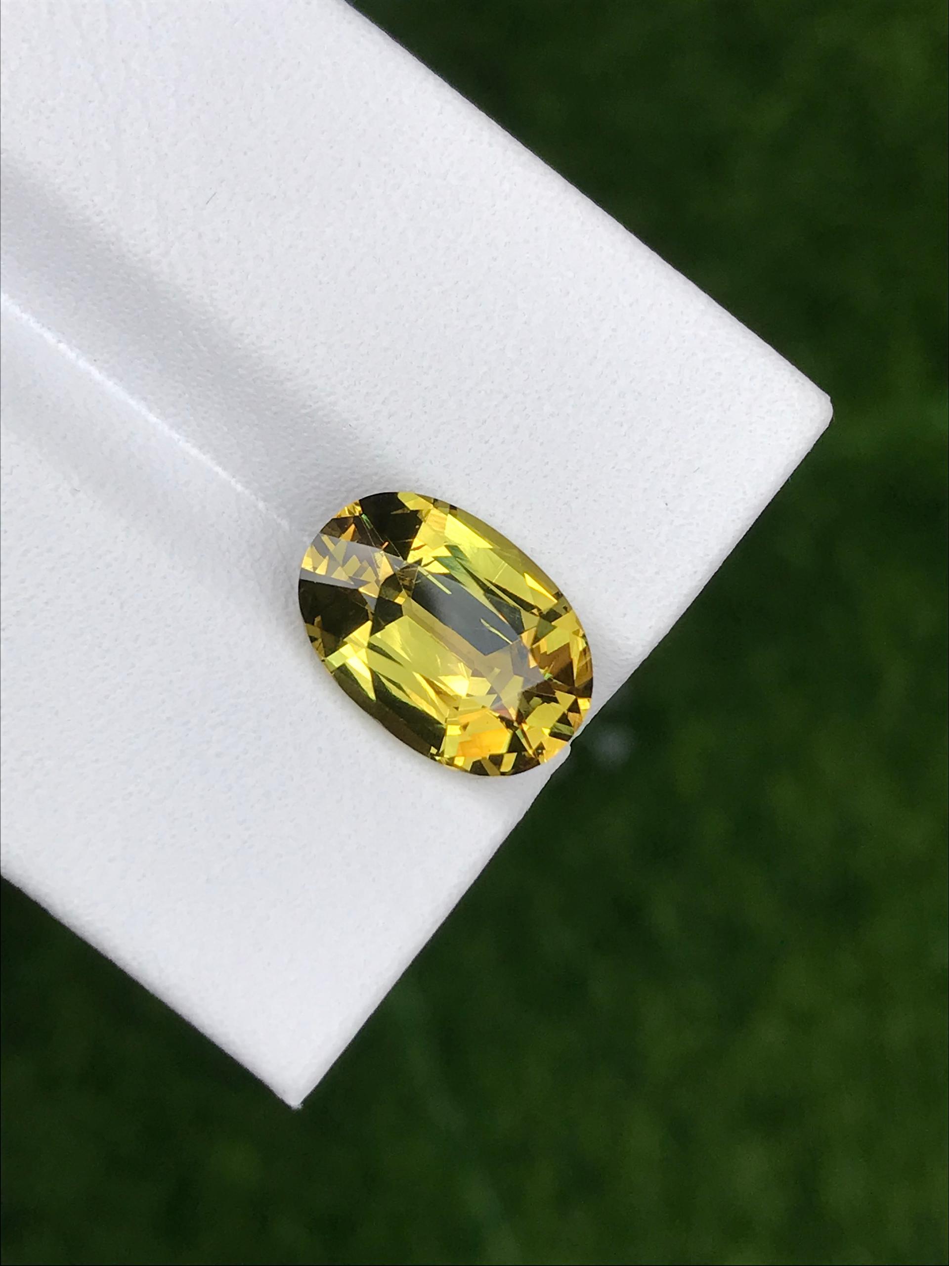 lemon yellow grossular garnet, 4.42ct oval cut — view 5
