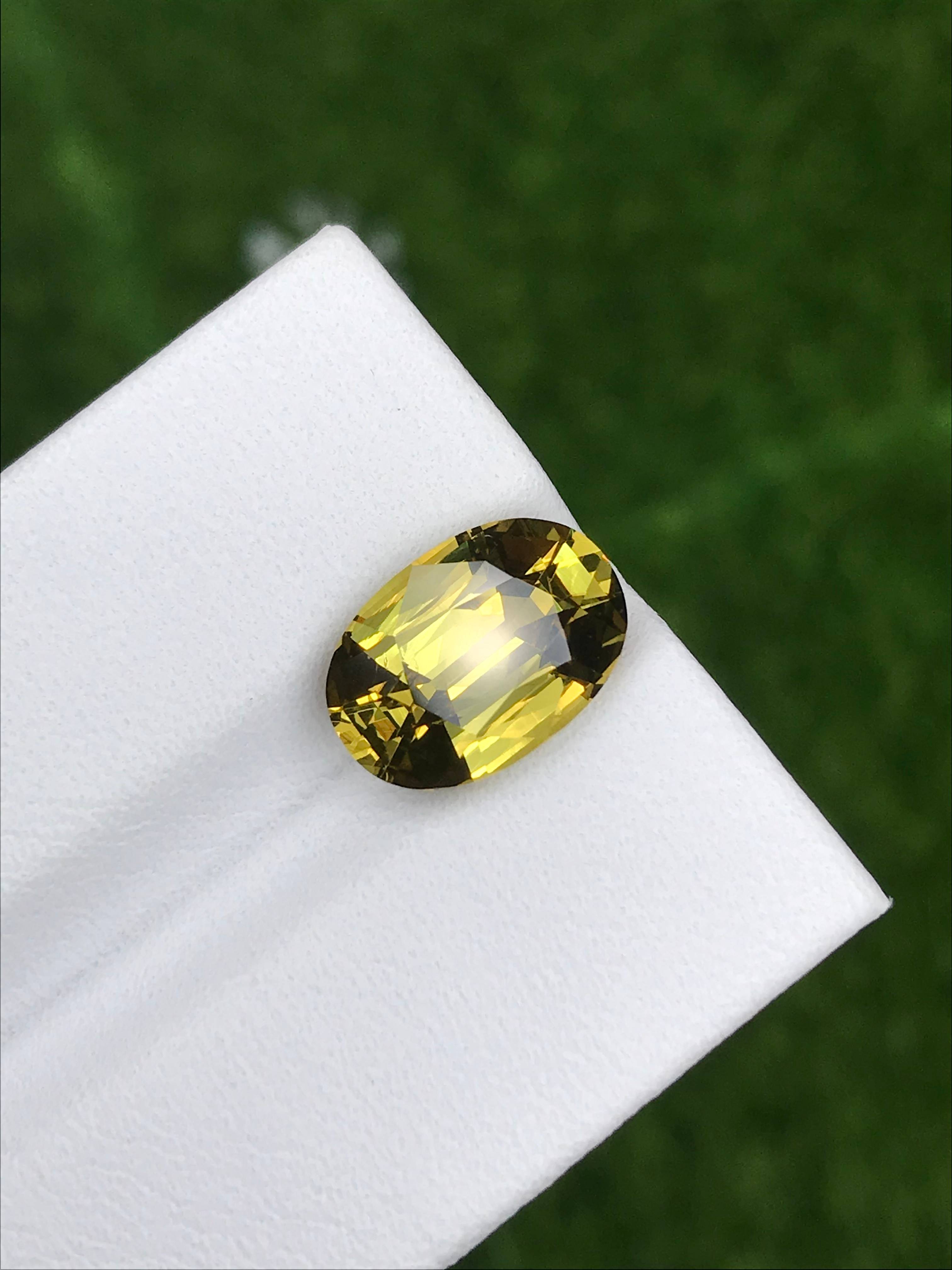 lemon yellow grossular garnet, 4.42ct oval cut — view 6