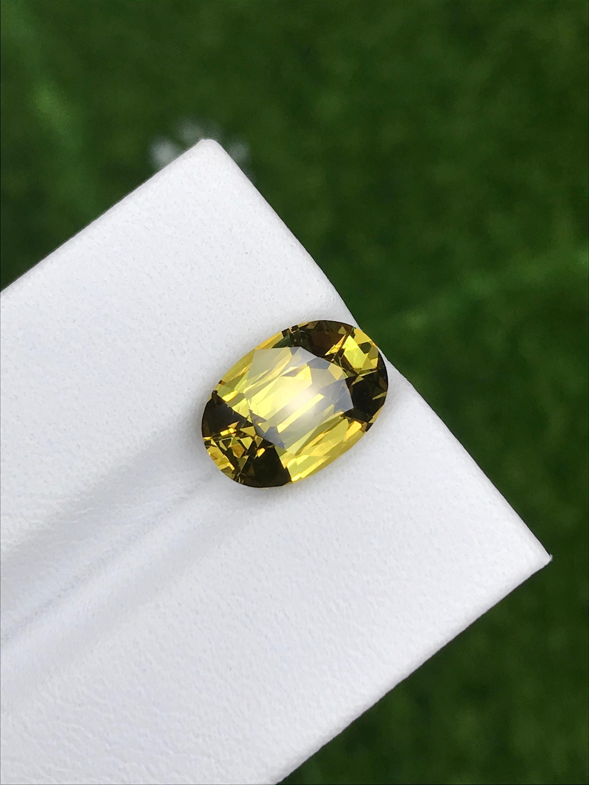 lemon yellow grossular garnet, 4.42ct oval cut — view 6