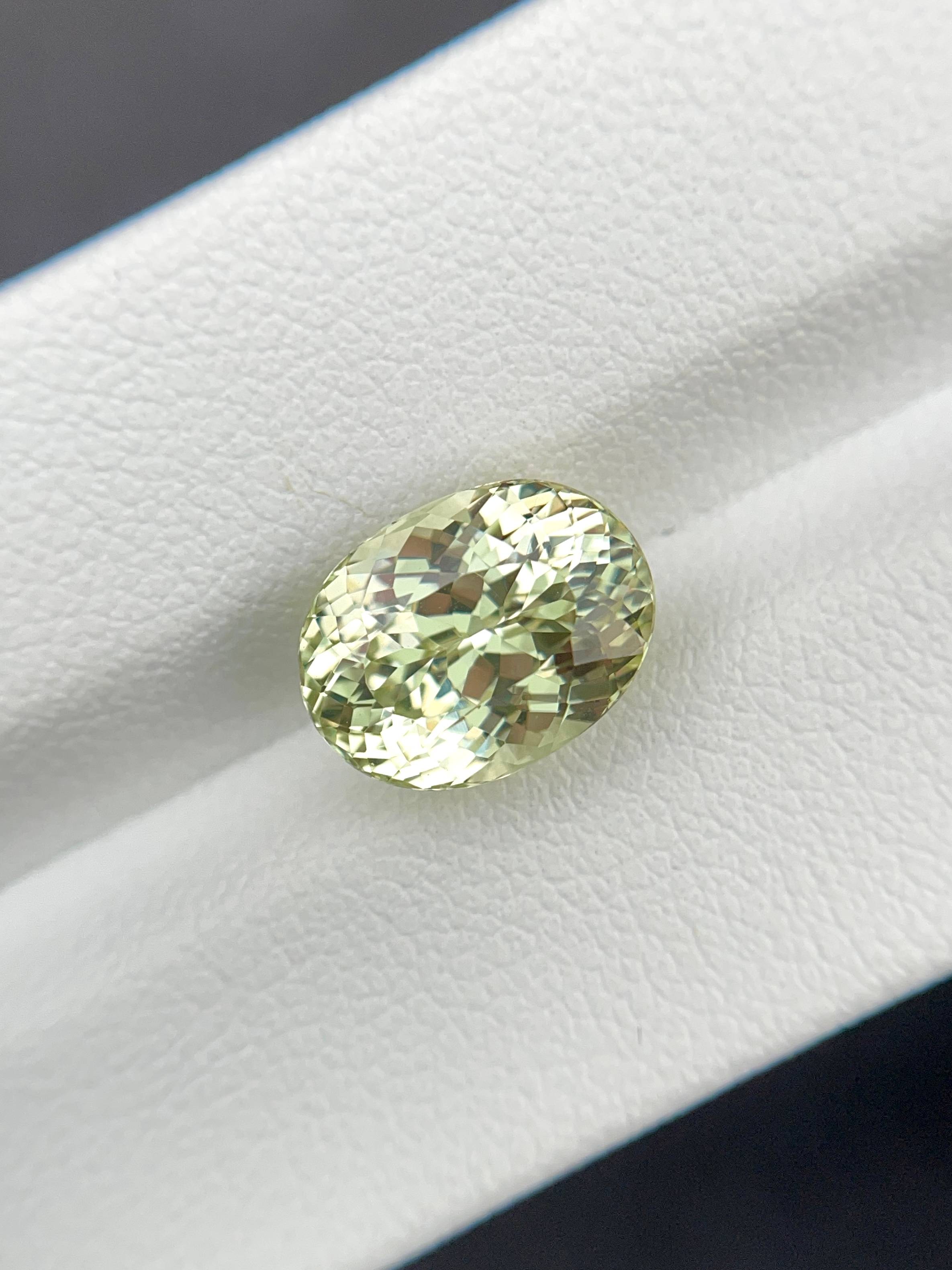lemon yellow grossular garnet, 5.19ct oval cut — view 5