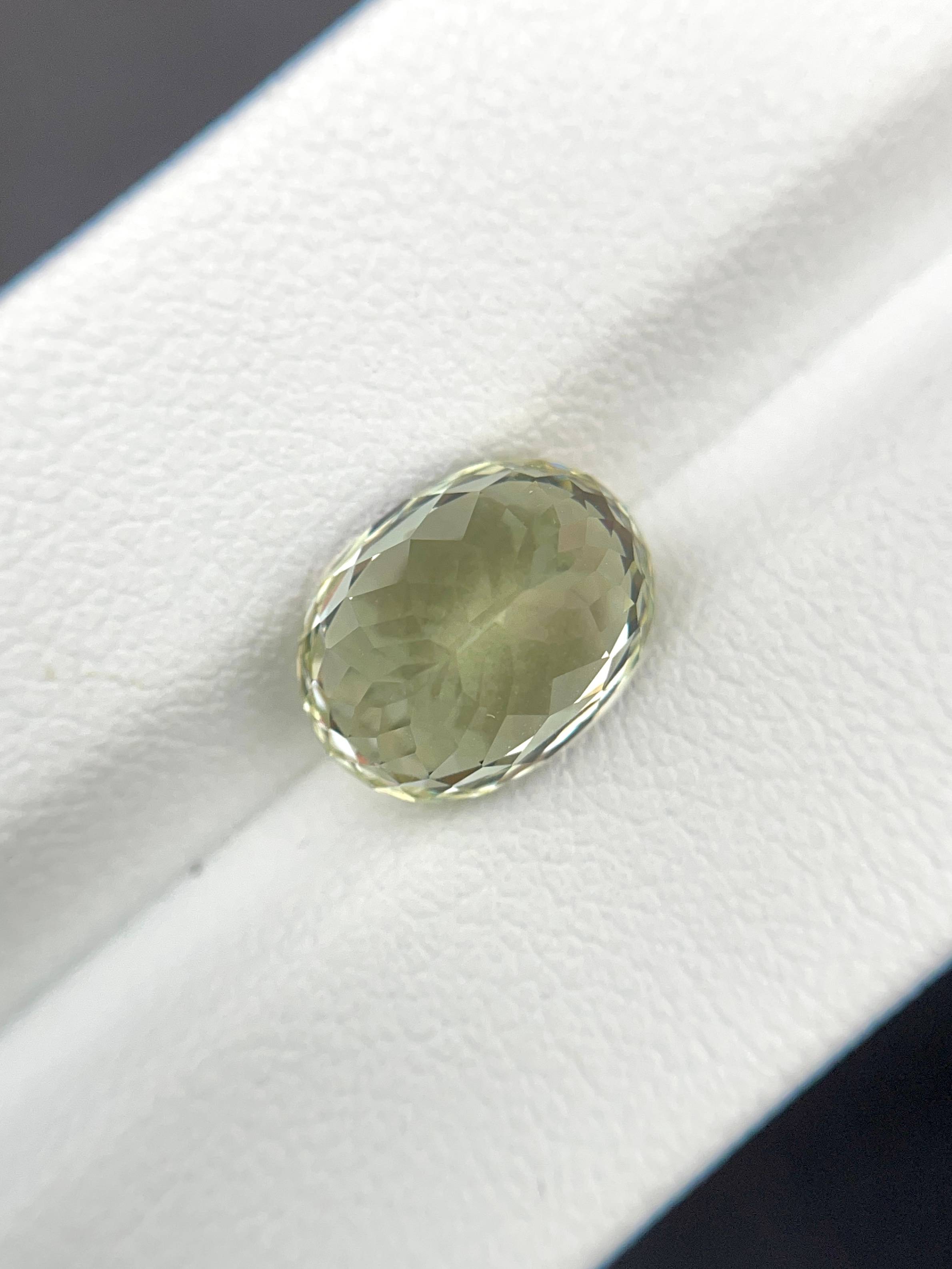 lemon yellow grossular garnet, 5.19ct oval cut — view 6