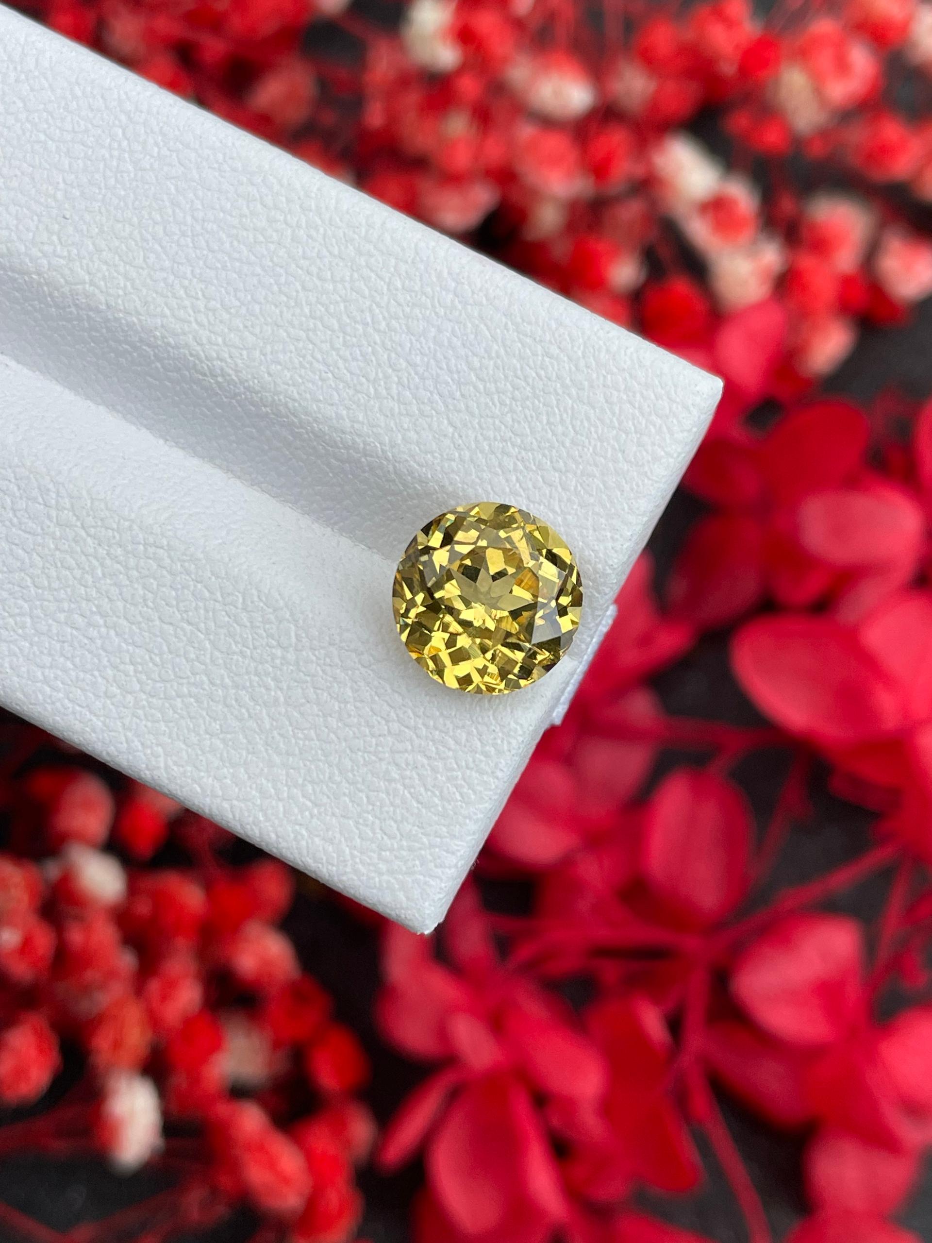 daffodil yellow grossular garnet, 4.74ct round cut — view 6