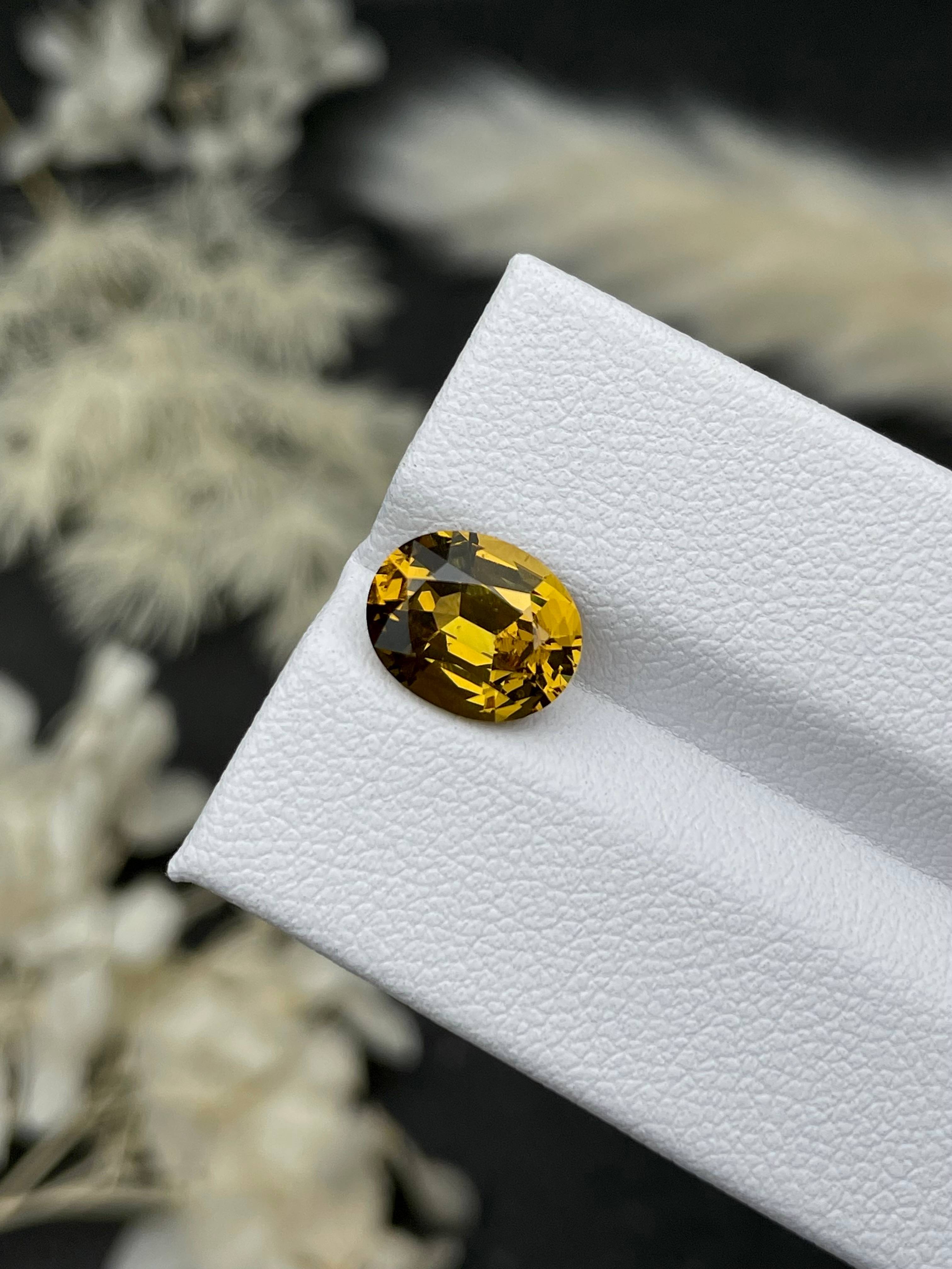 honey yellow grossular garnet, 3.41ct oval cut — view 5