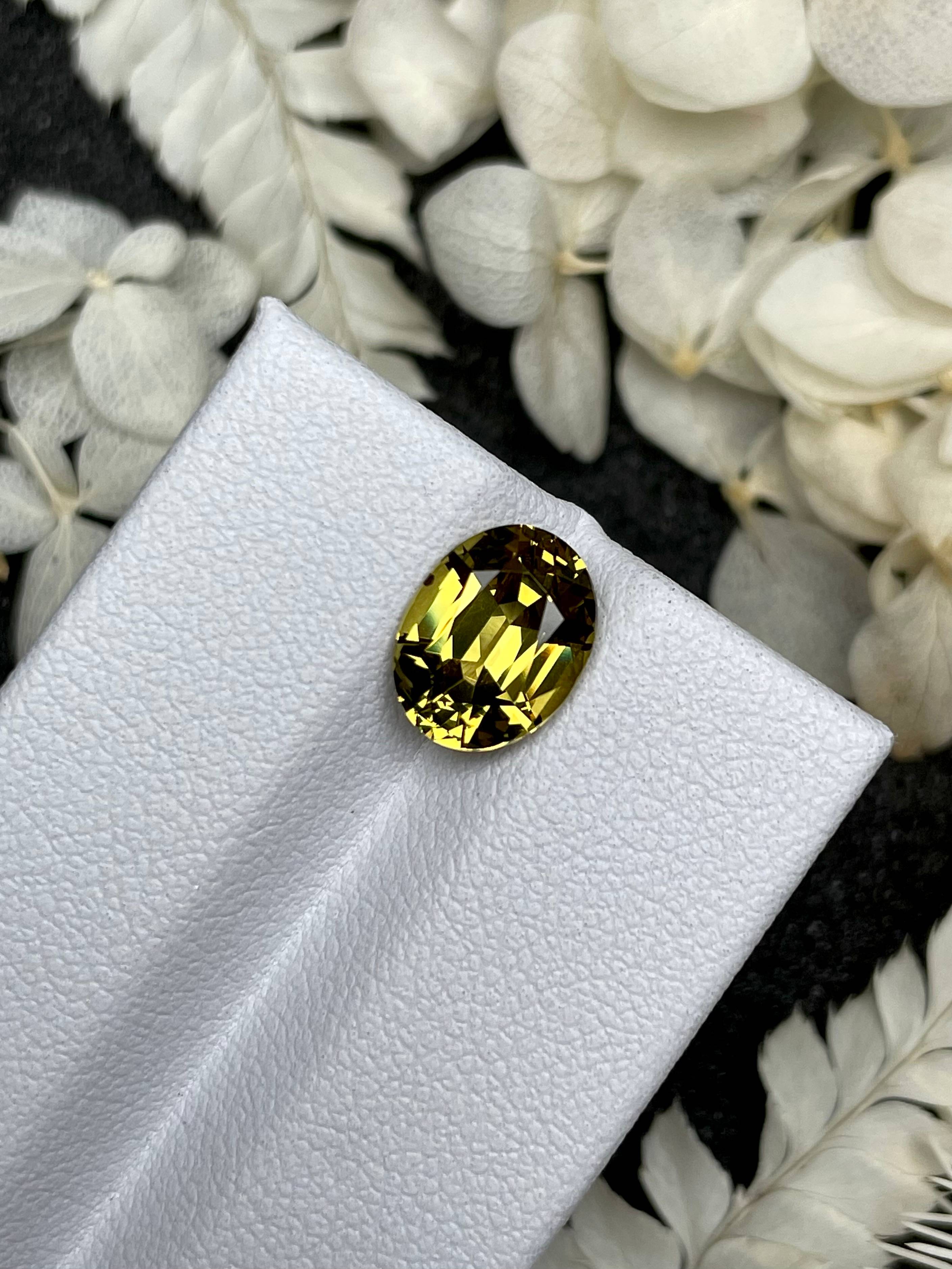 corn yellow grossular garnet, 3.38ct oval cut — view 5