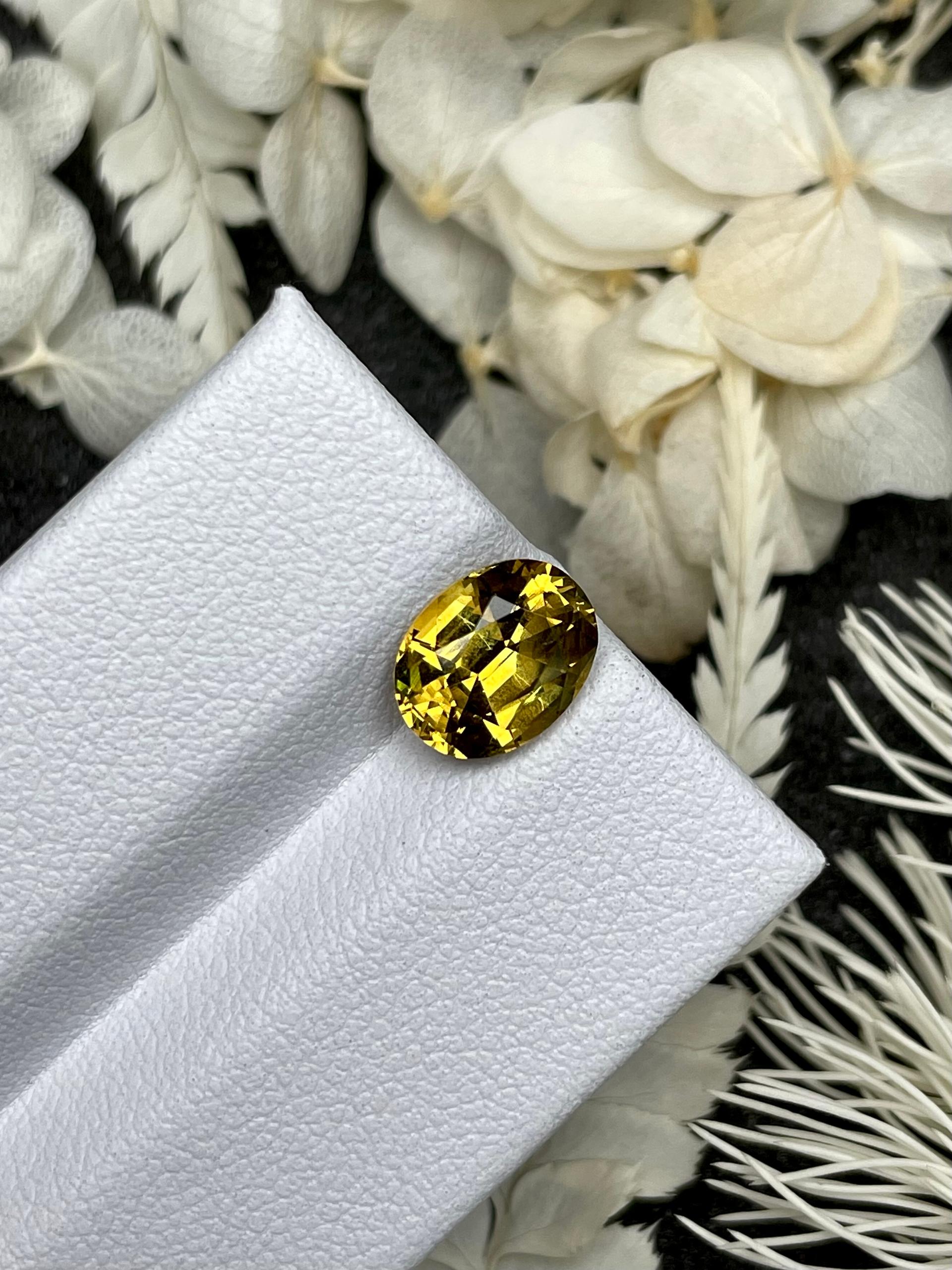 corn yellow grossular garnet, 2.49ct oval cut — view 5