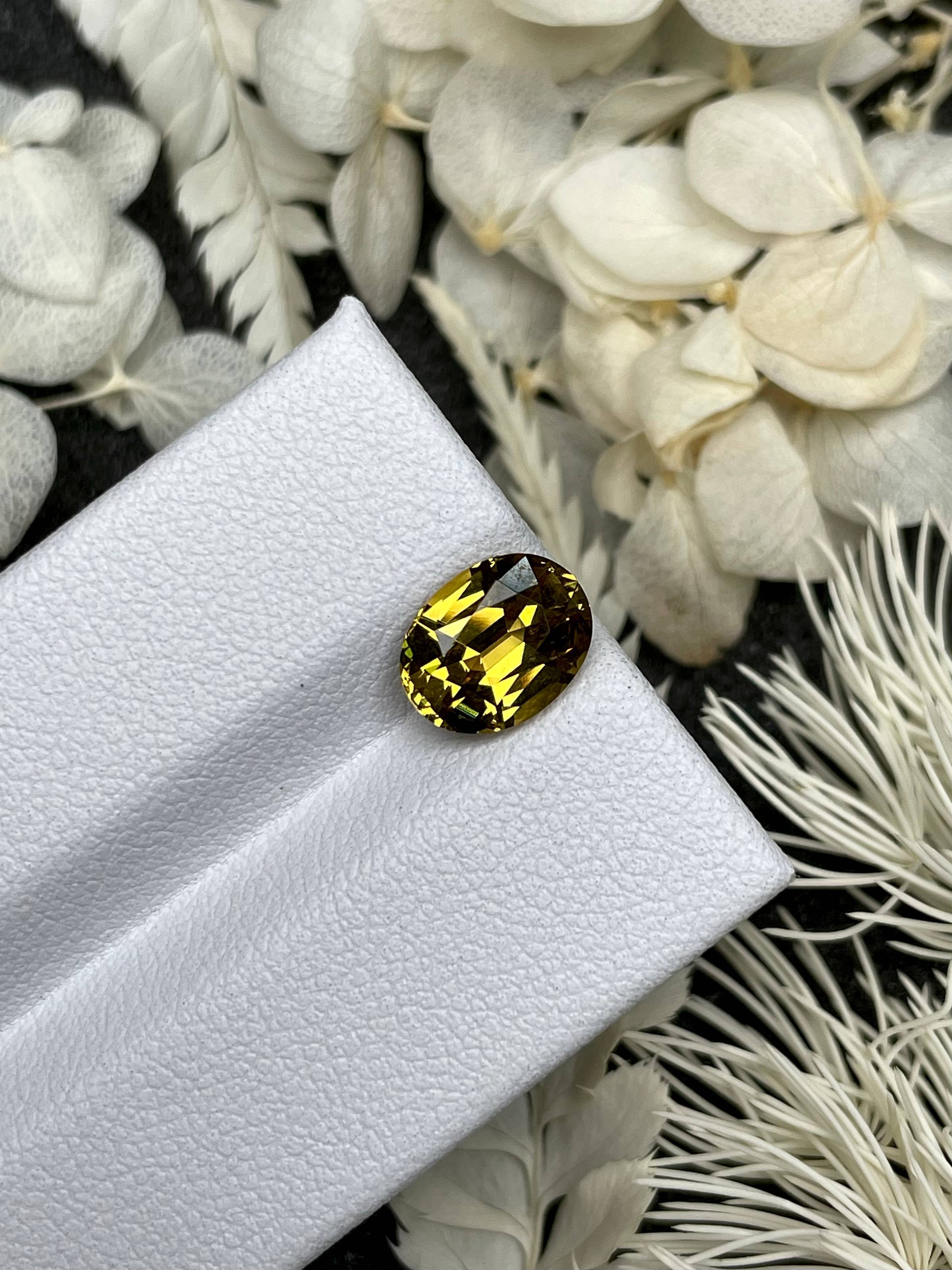 corn yellow grossular garnet, 2.63ct oval cut — view 5