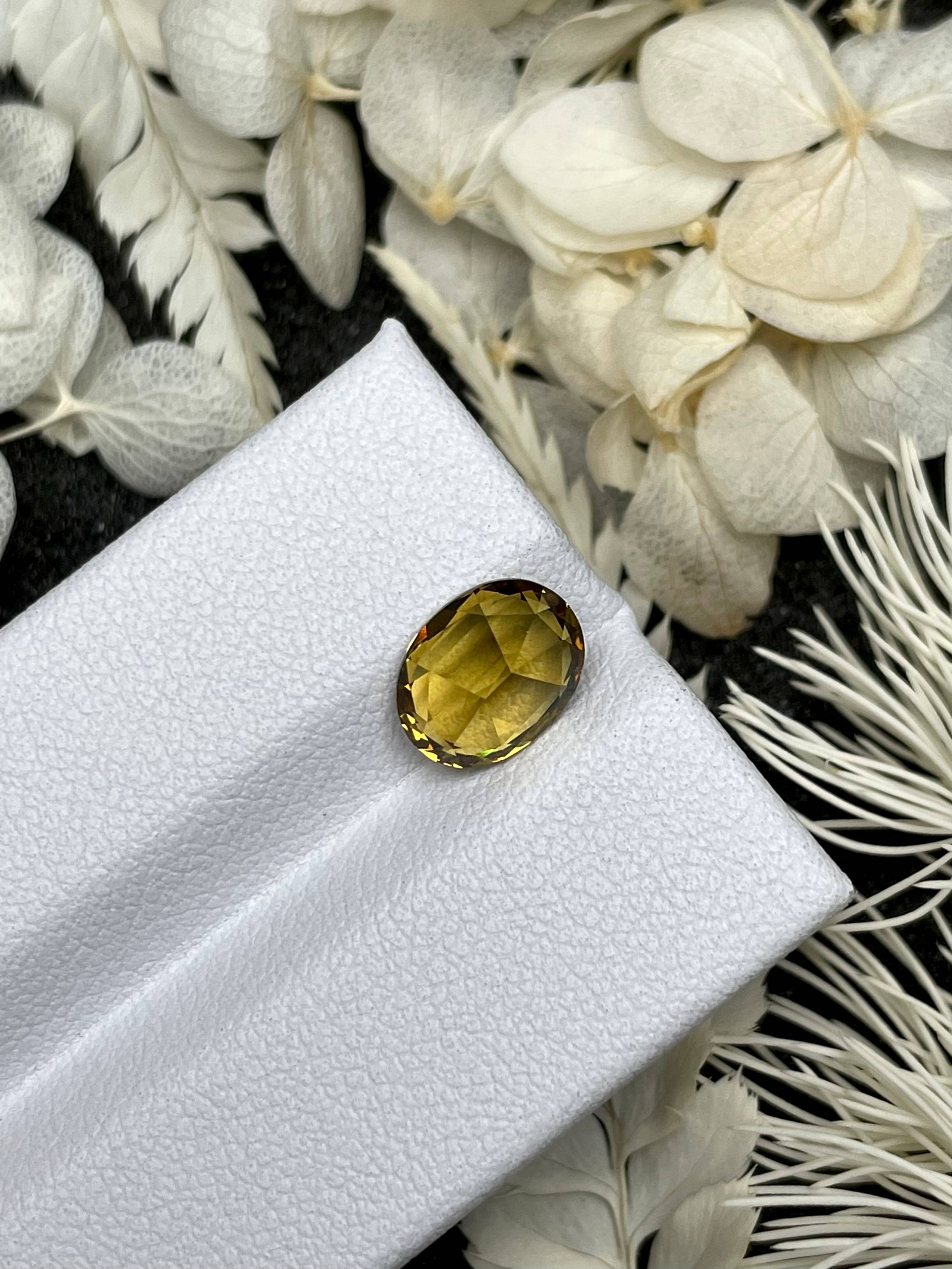 corn yellow grossular garnet, 2.63ct oval cut — view 6