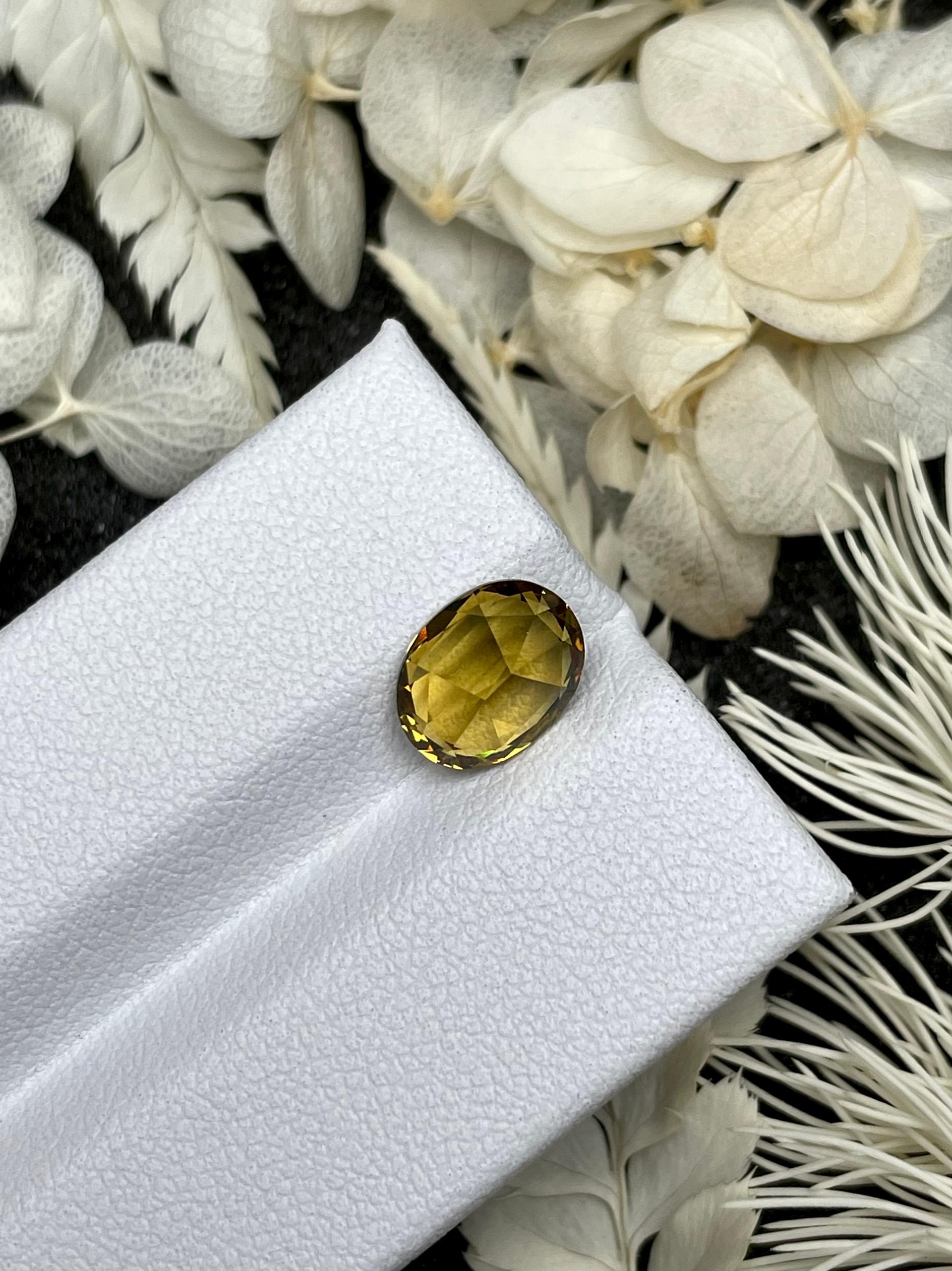 corn yellow grossular garnet, 2.63ct oval cut — view 6