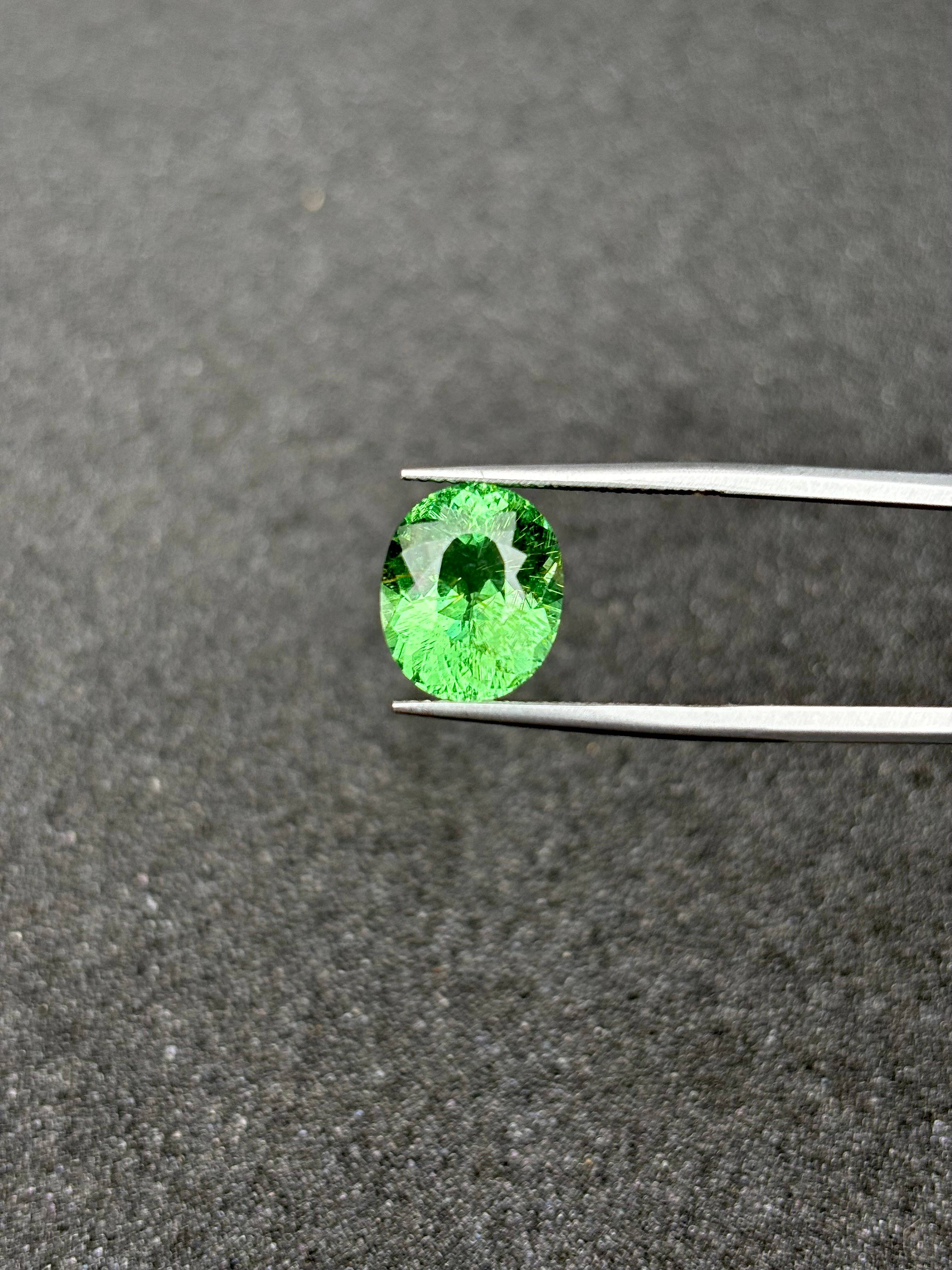green paraiba tourmaline, 4.92ct oval cut — view 5