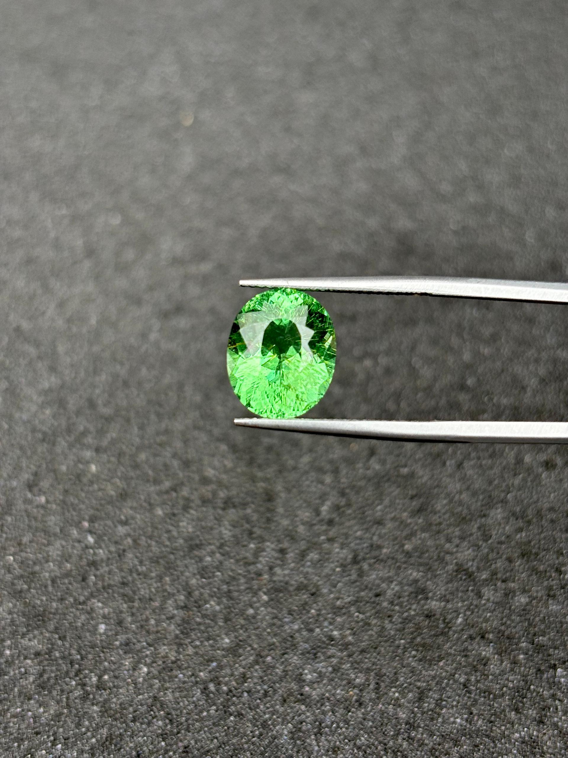 green paraiba tourmaline, 4.92ct oval cut — view 5