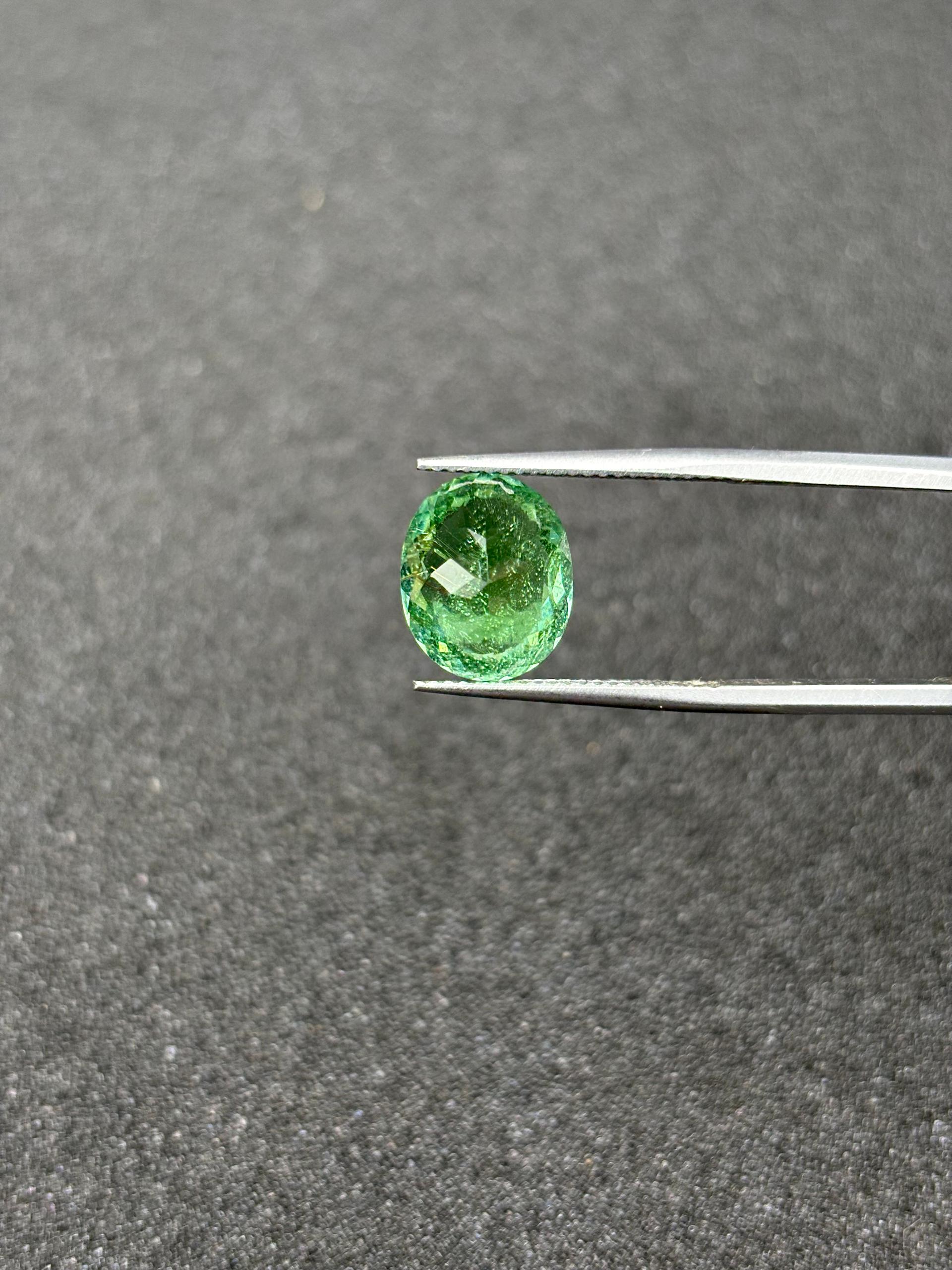 green paraiba tourmaline, 4.92ct oval cut — view 6