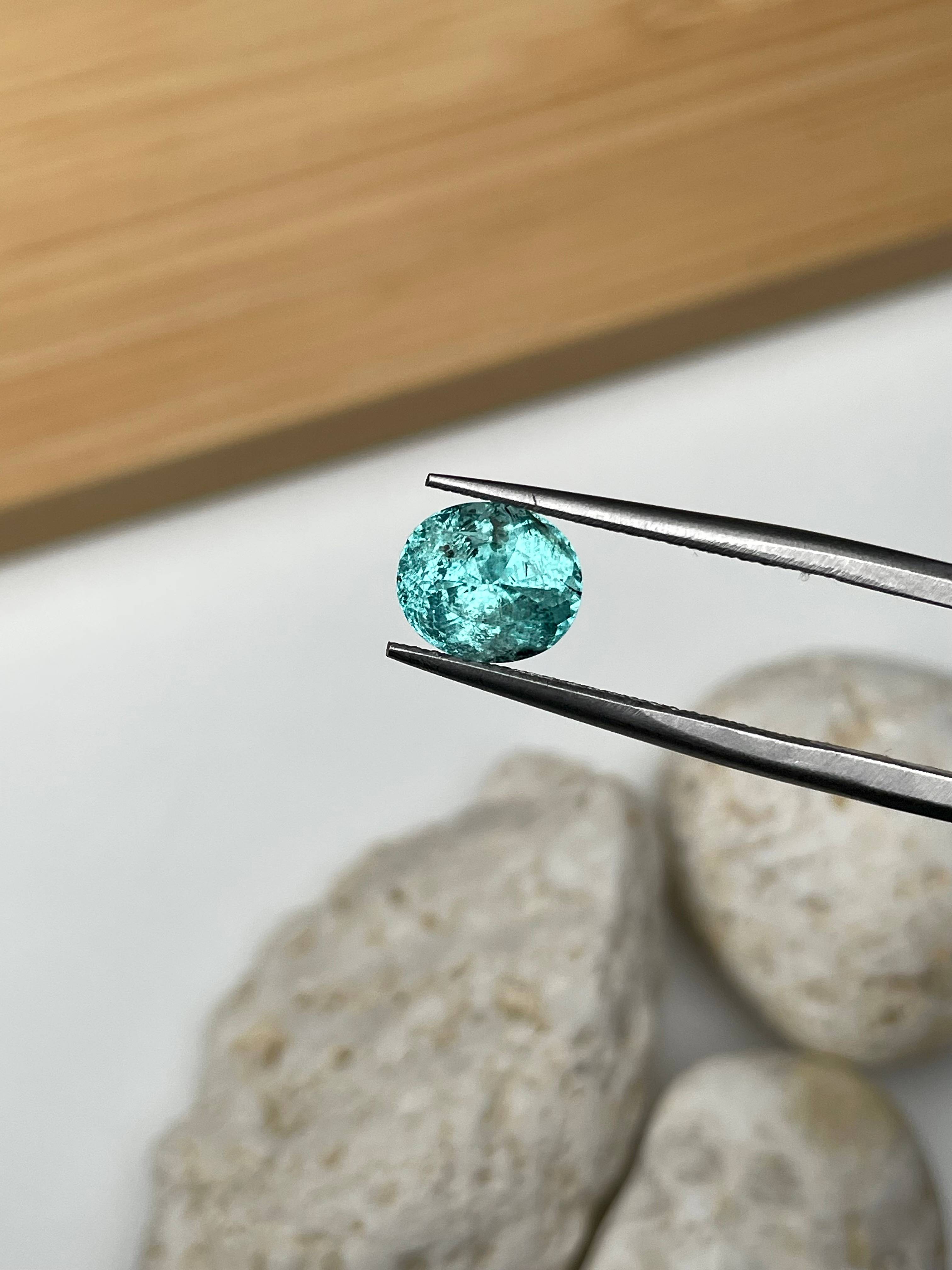 Neon blue paraiba tourmaline, 1.73ct oval cut — view 5