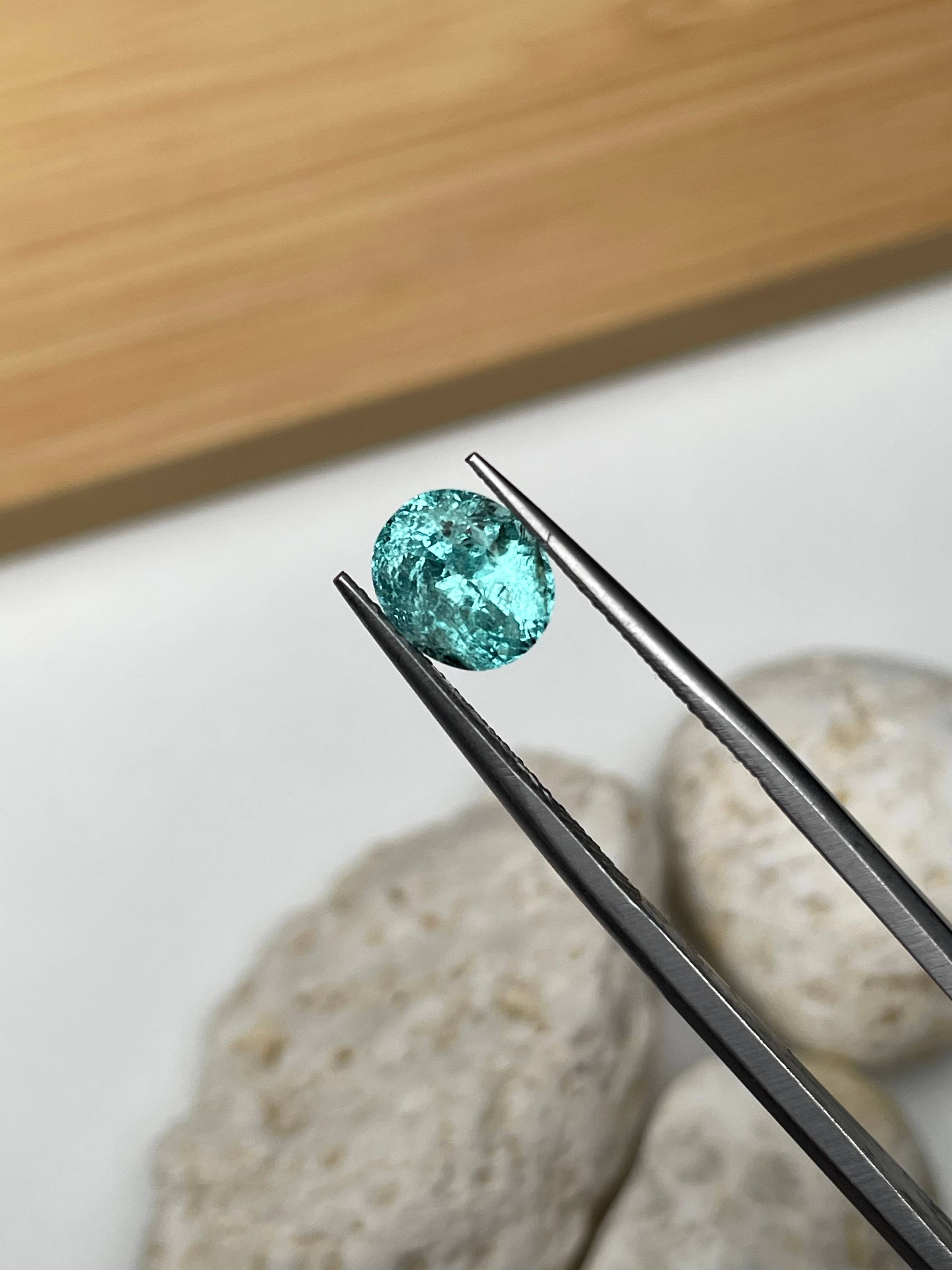 Neon blue paraiba tourmaline, 1.73ct oval cut — view 6