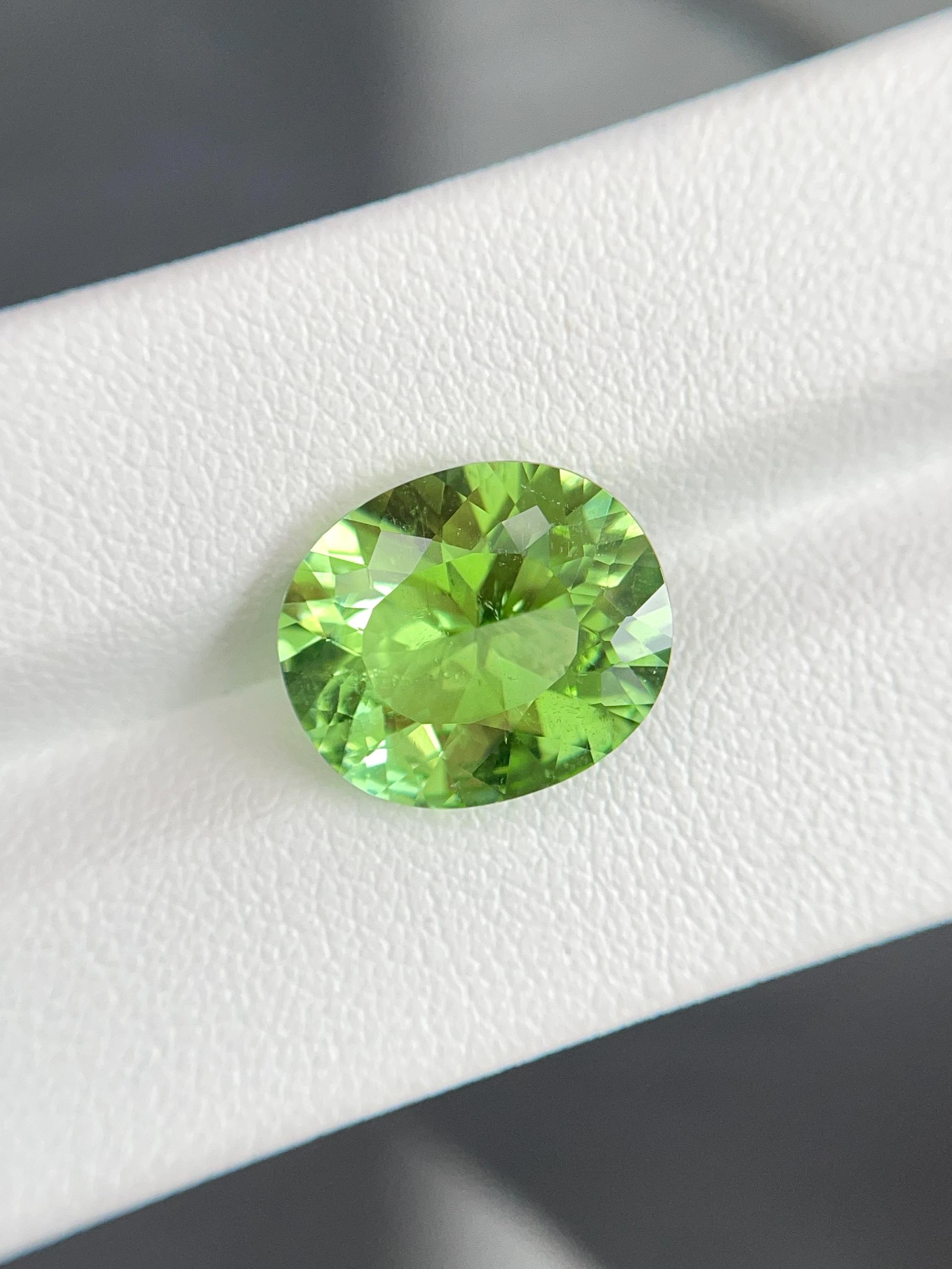 green paraiba tourmaline, 6.82ct oval cut — view 5