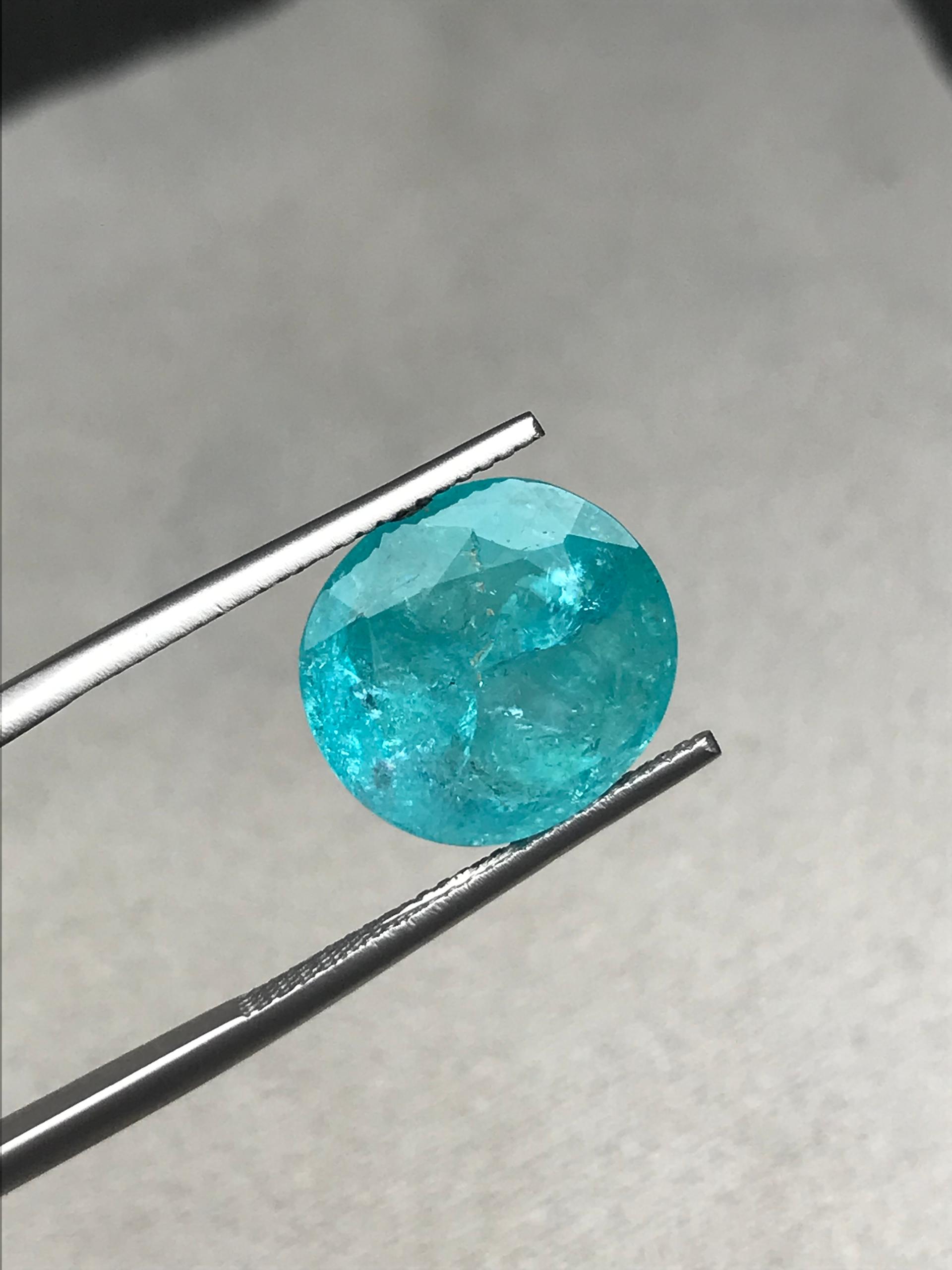 Neon blue paraiba tourmaline, 6.88ct oval cut — view 6