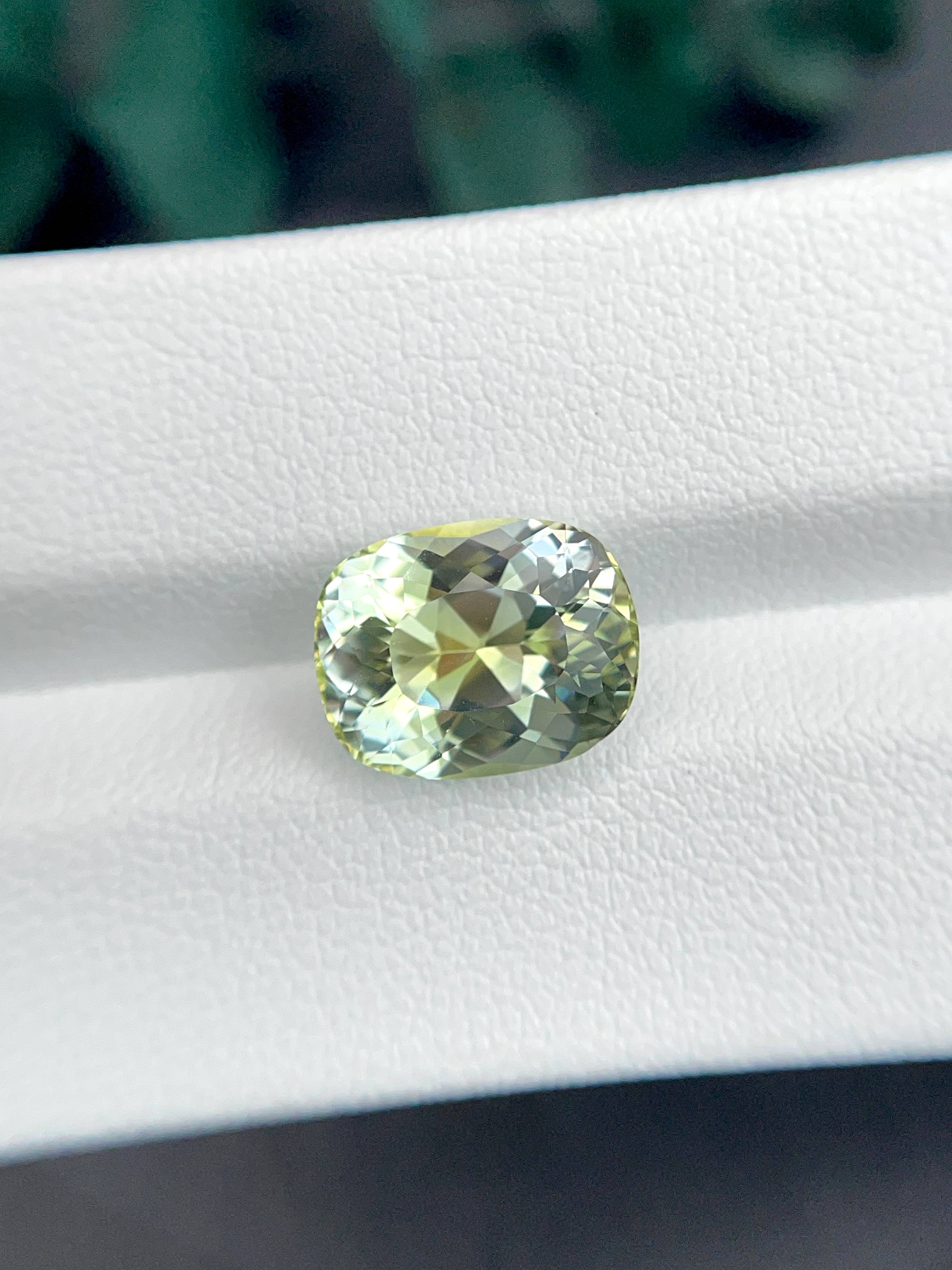 lime green paraiba tourmaline, 4.98ct oval cut — view 5