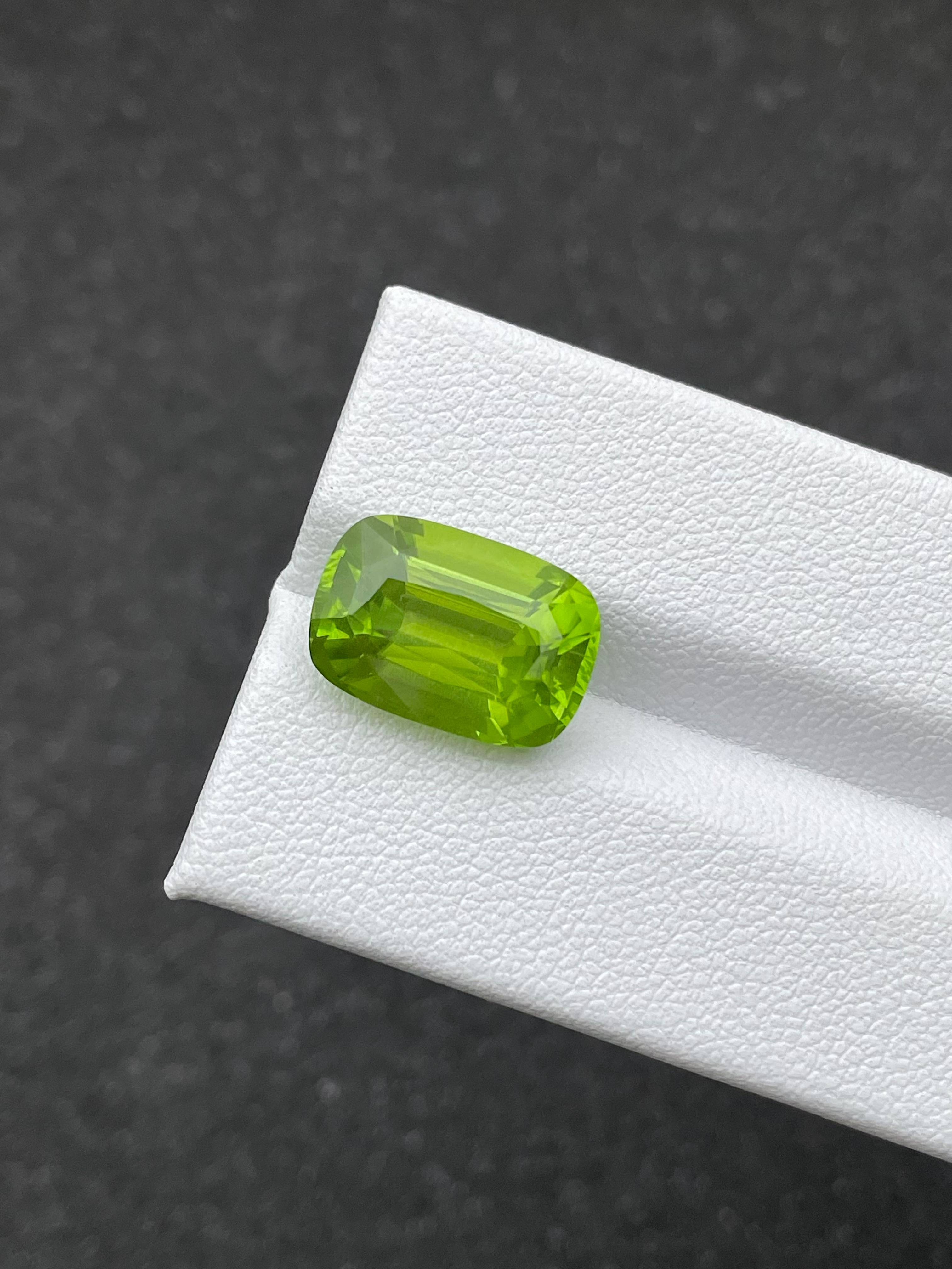 pistachio green peridot, 8.14ct cushion cut — view 5