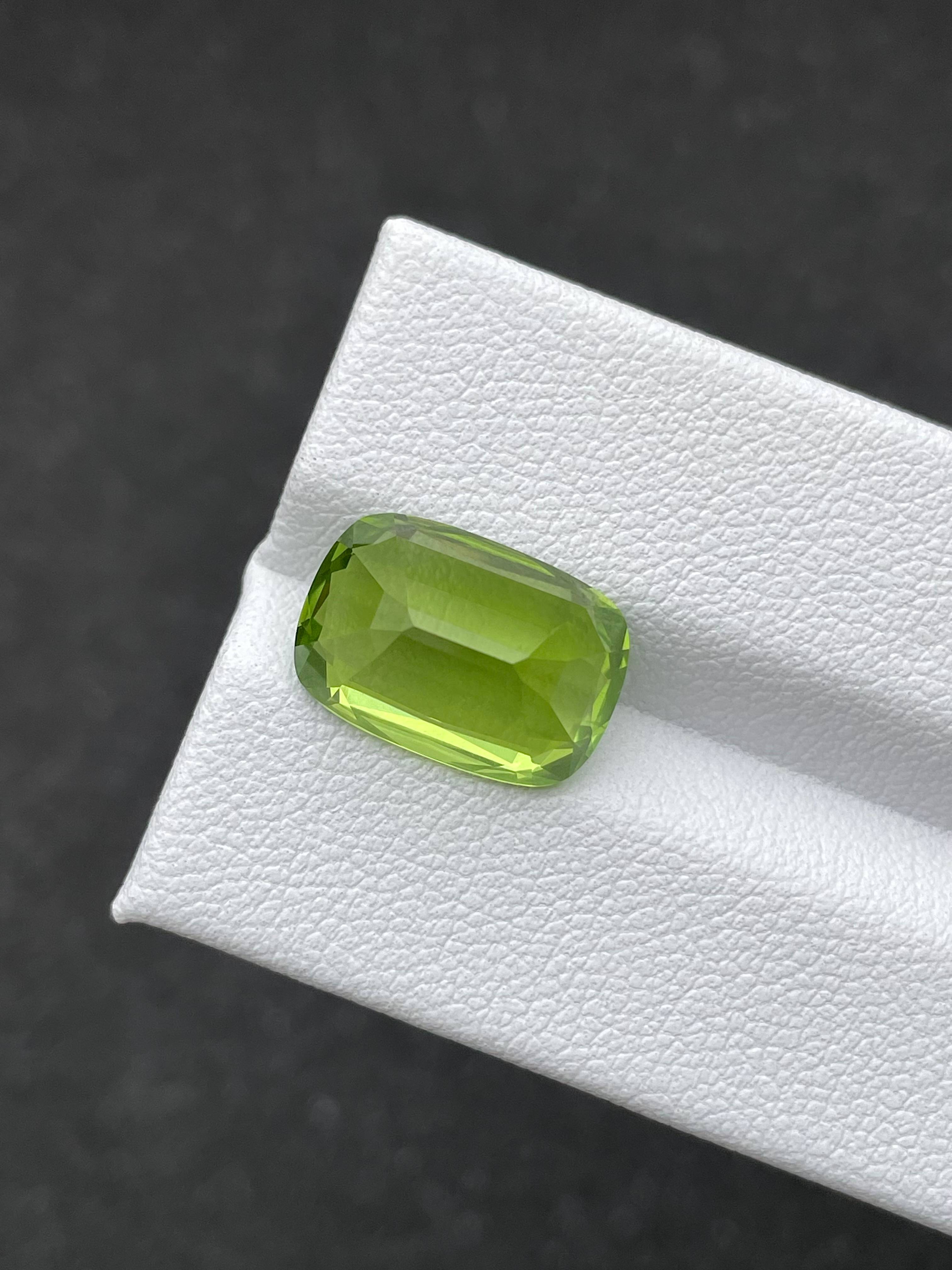 pistachio green peridot, 8.14ct cushion cut — view 6
