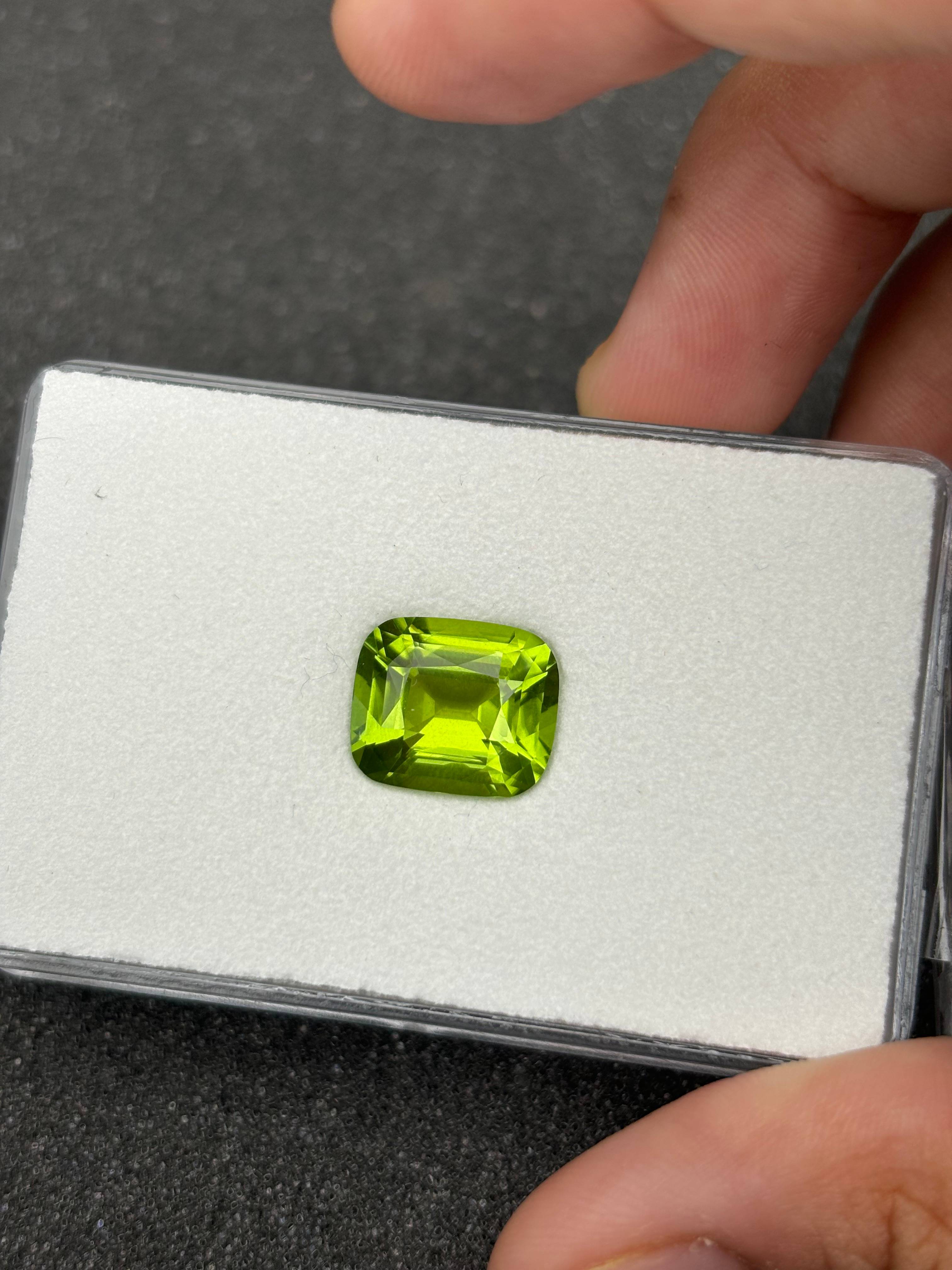 pistachio green peridot, 5.68ct cushion cut — view 5