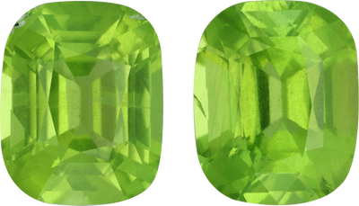 Cushion cut peridot, 10.6 by 8.6 mm, shown at actual size