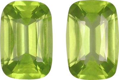 Cushion cut peridot, 10.6 by 7.1 mm, shown at actual size