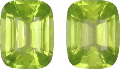 Cushion cut peridot, 10.1 by 7.9 mm, shown at actual size