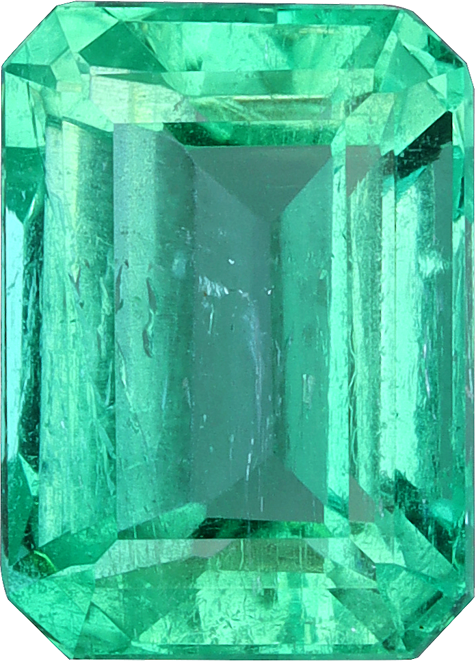 Rectangular cut colombian emerald, 8.22 by 5.92 mm, shown at actual size