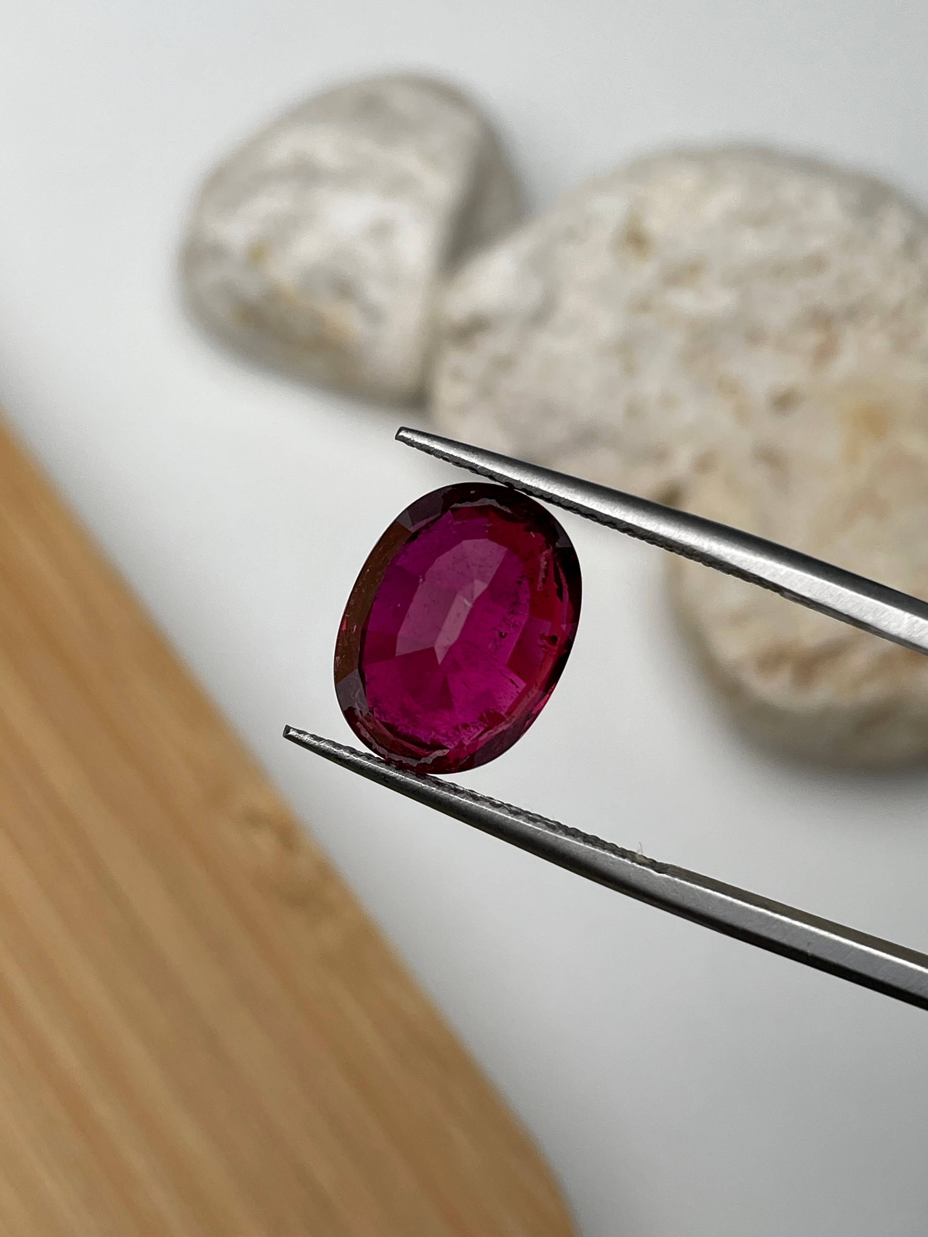 red rubellite tourmaline, 6.62ct oval cut — view 7