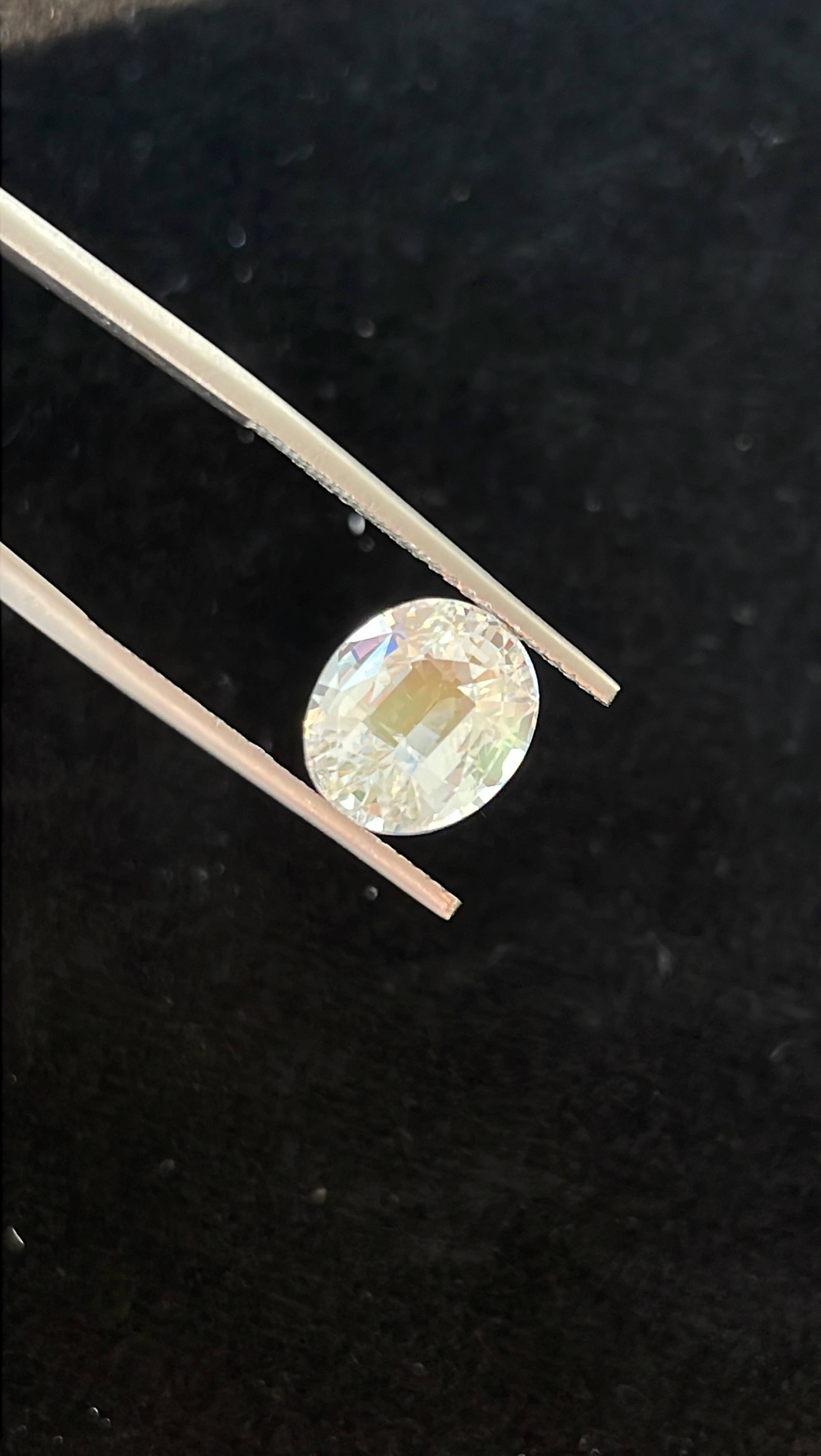 mixed colour rainbow moonstone, 4.42ct oval cut — view 5
