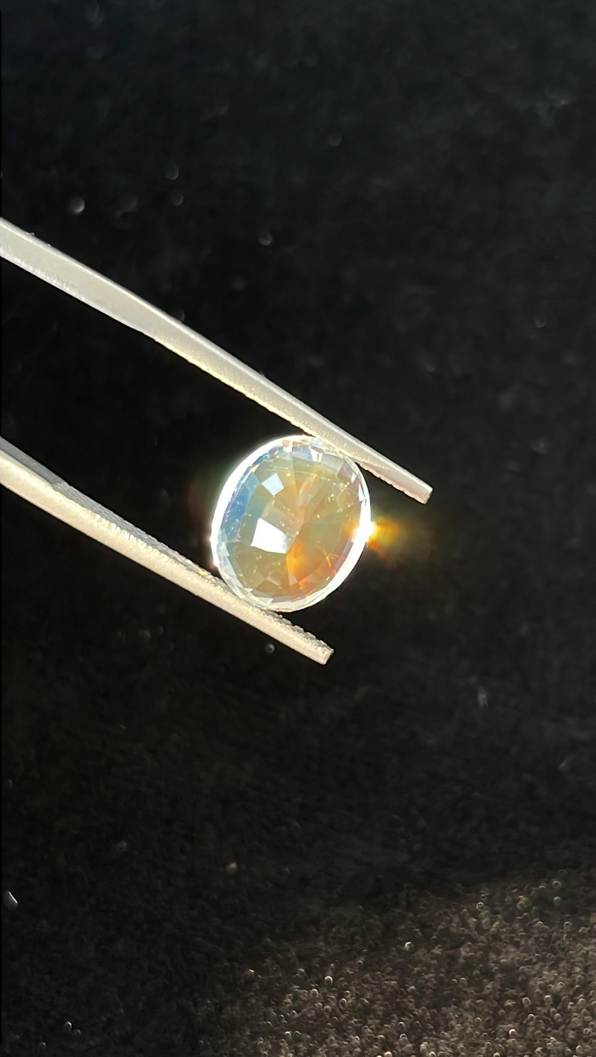 mixed colour rainbow moonstone, 4.42ct oval cut — view 9