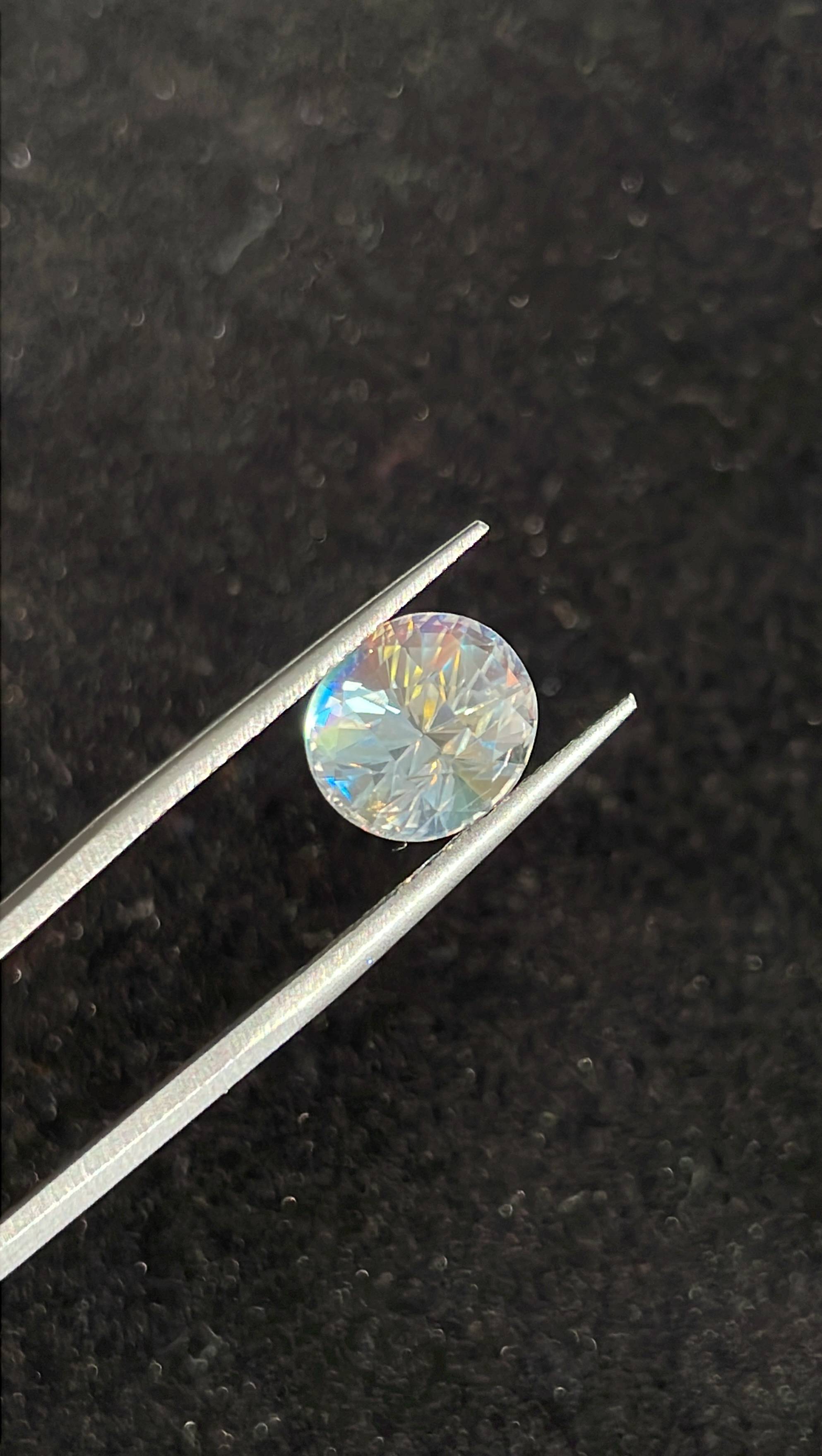 mixed colour rainbow moonstone, 3.47ct oval cut — view 5