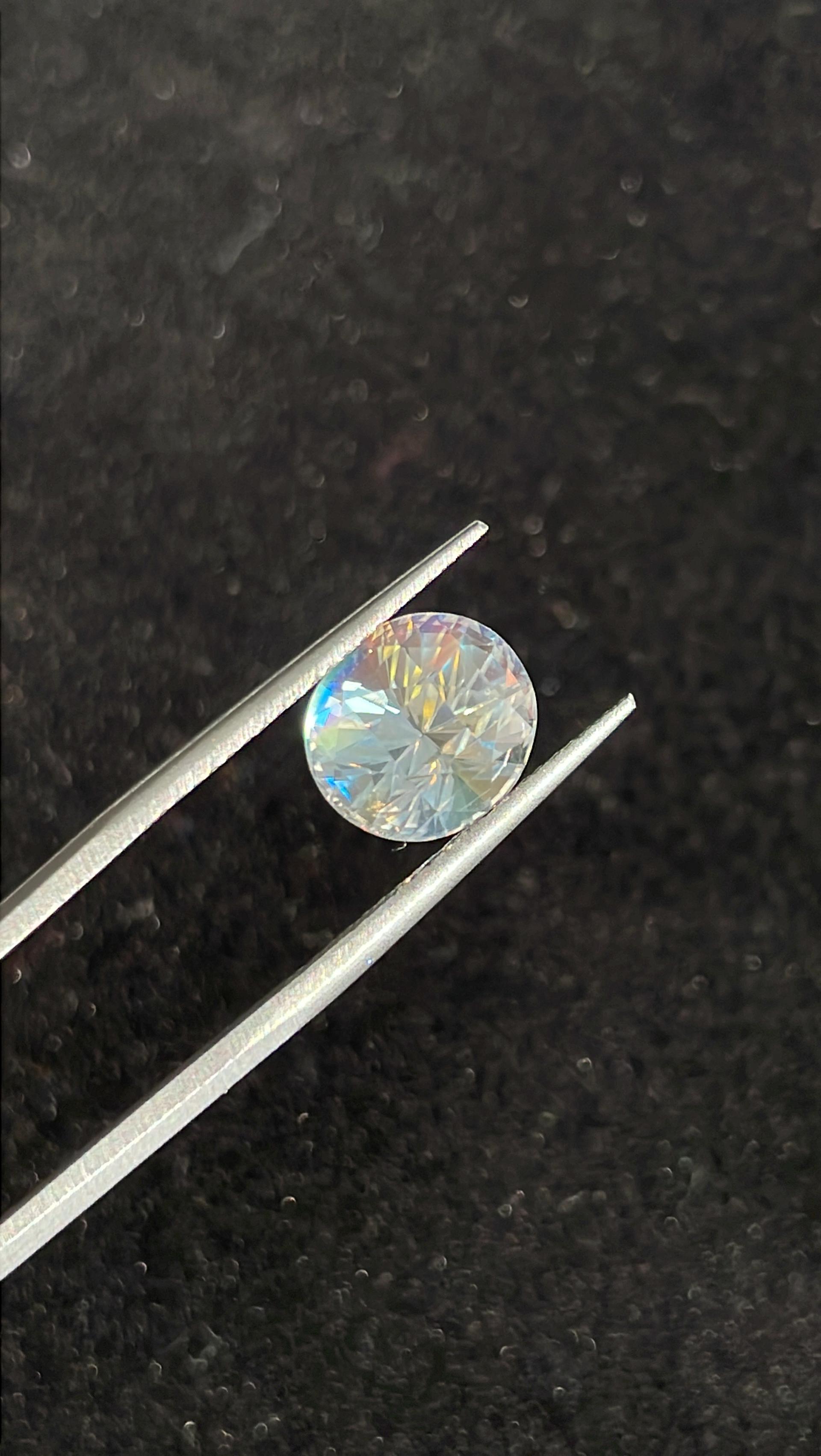 mixed colour rainbow moonstone, 3.47ct oval cut — view 5