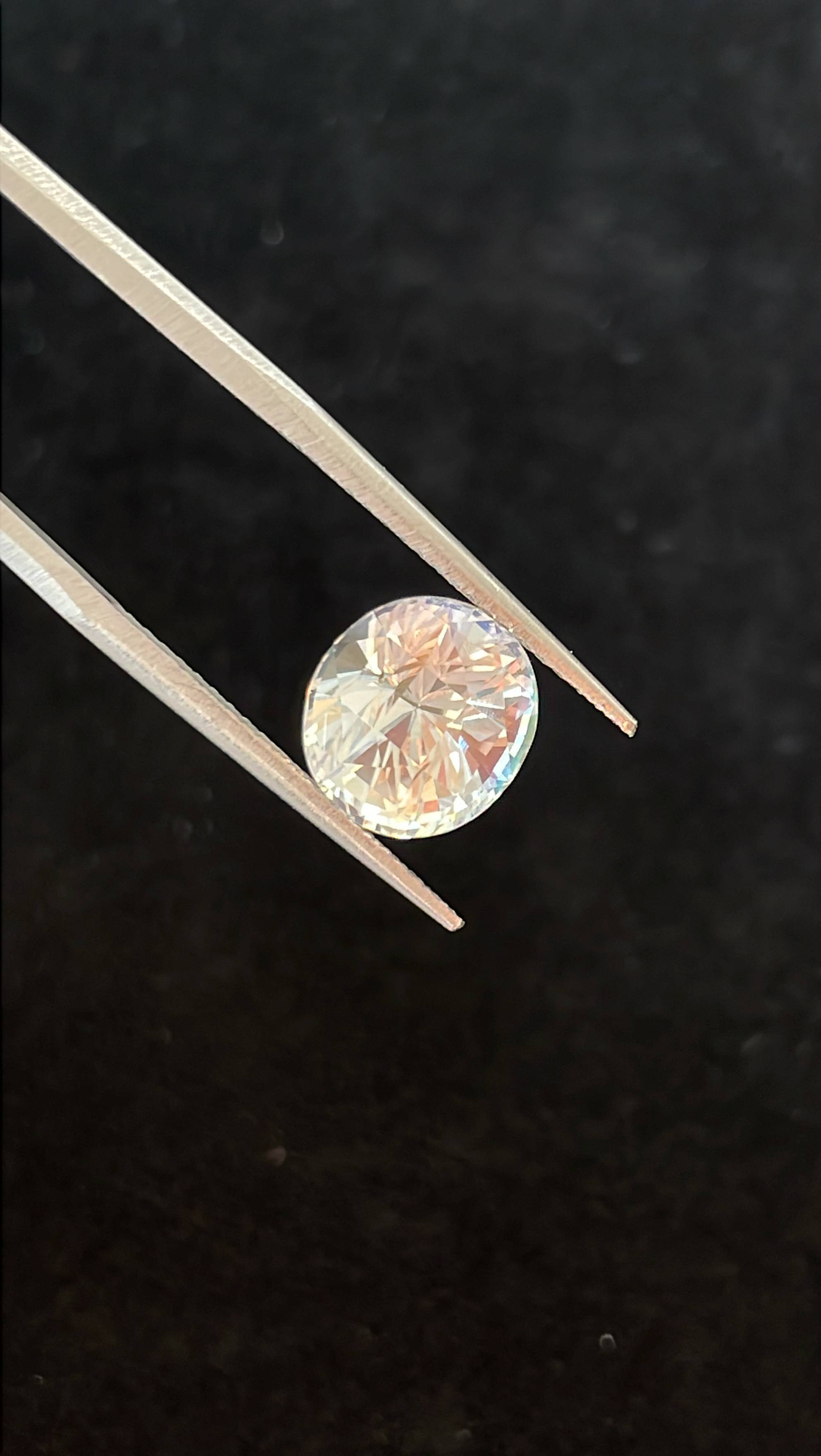 mixed colour rainbow moonstone, 3.47ct oval cut — view 8