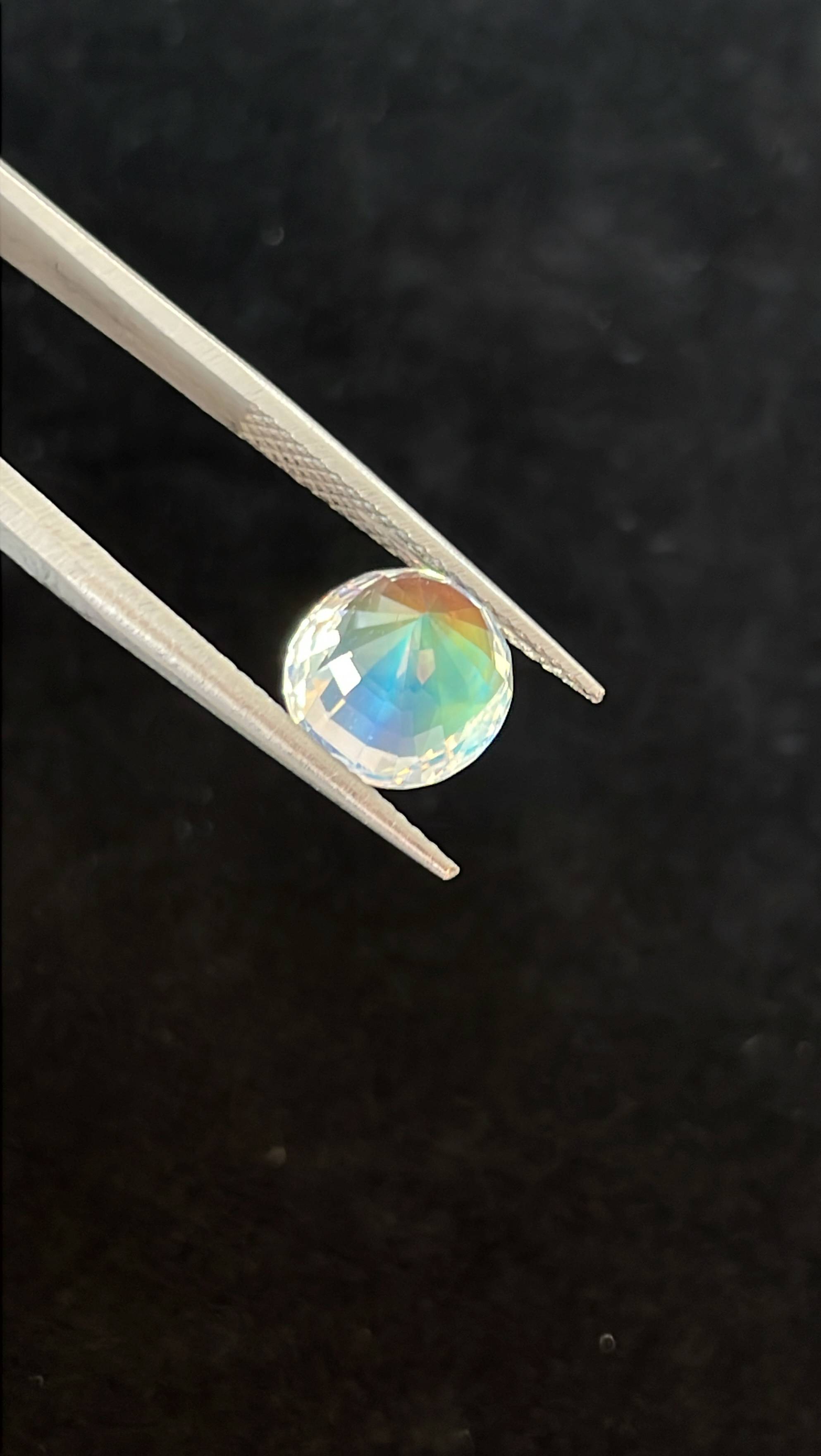 mixed colour rainbow moonstone, 3.47ct oval cut — view 11