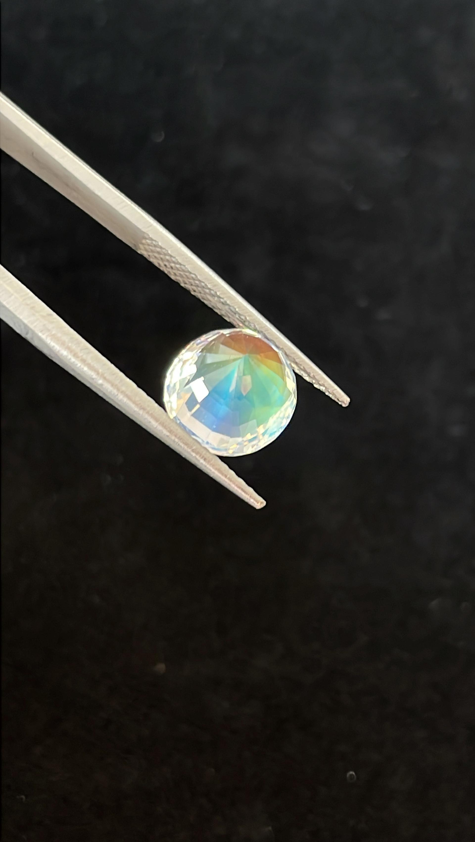 mixed colour rainbow moonstone, 3.47ct oval cut — view 11