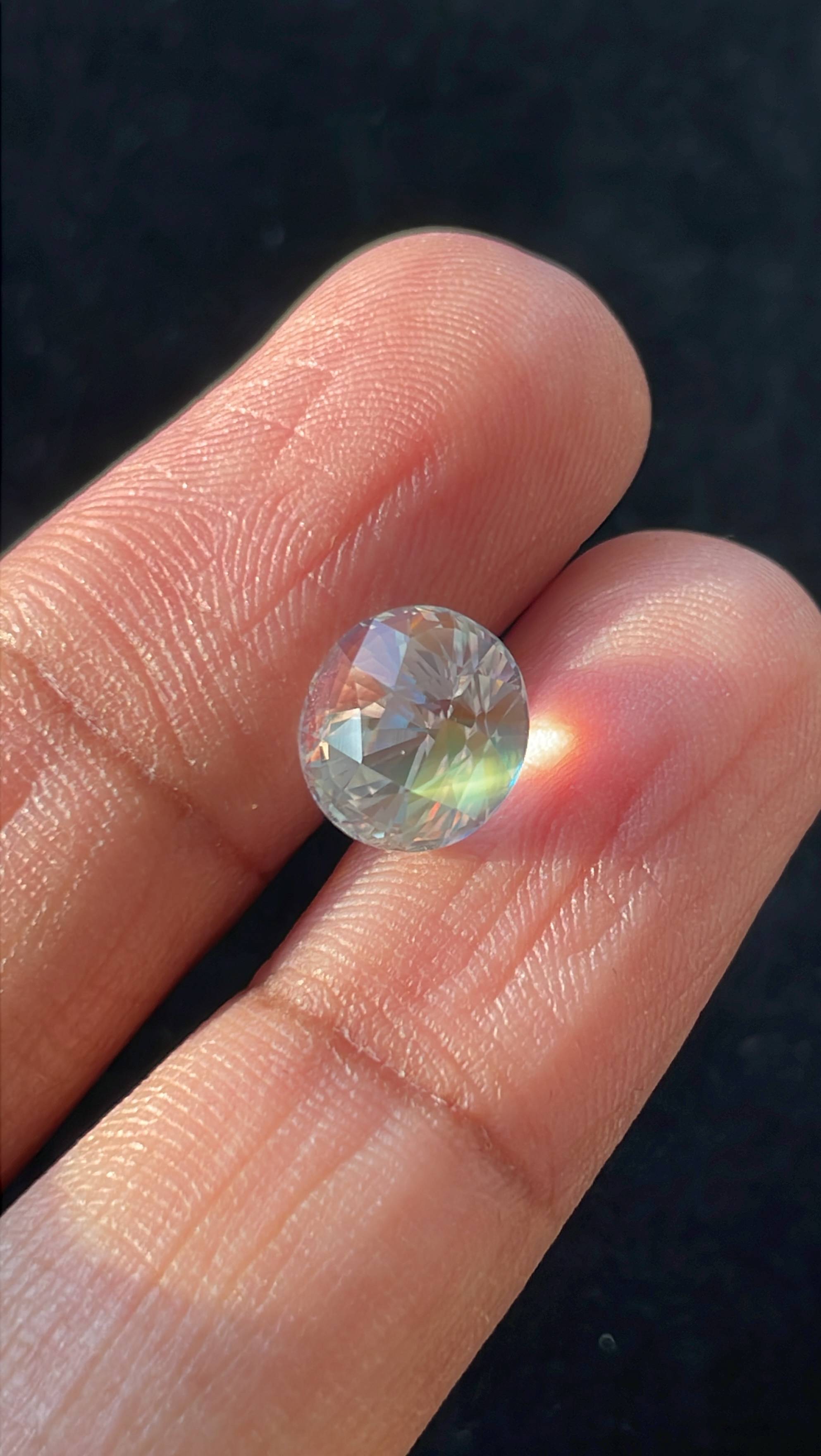 mixed colour rainbow moonstone, 3.47ct oval cut — view 13