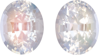 Oval cut rainbow moonstone, 10.19 by 8.11 mm, shown at actual size
