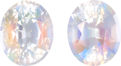 Oval cut rainbow moonstone, 10.34 by 8.45 mm, shown at actual size