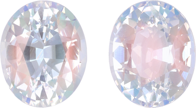 Oval cut rainbow moonstone, 8.54 by 6.96 mm, shown at actual size