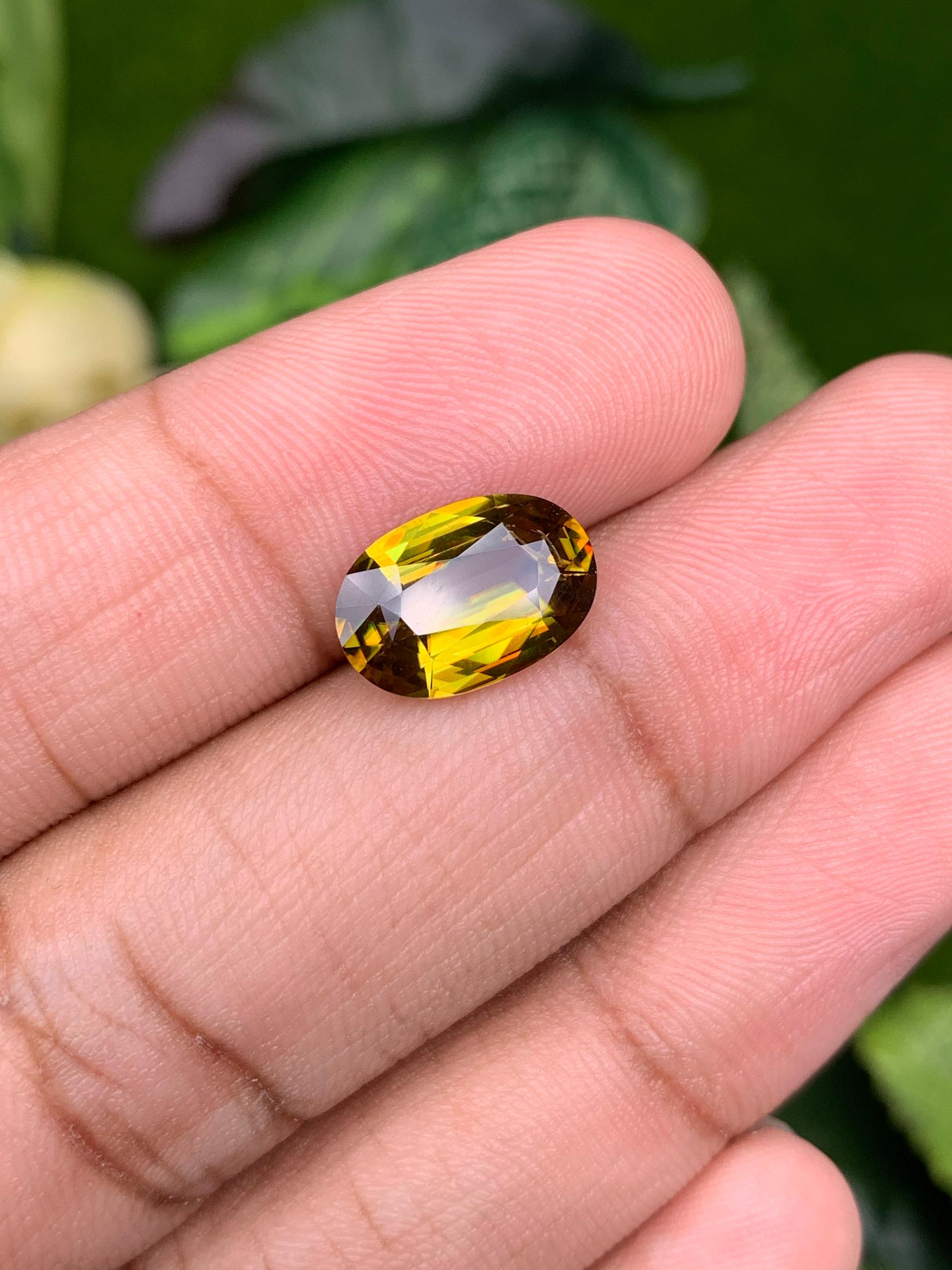 corn yellow sphene, 4.19ct oval cut — view 5