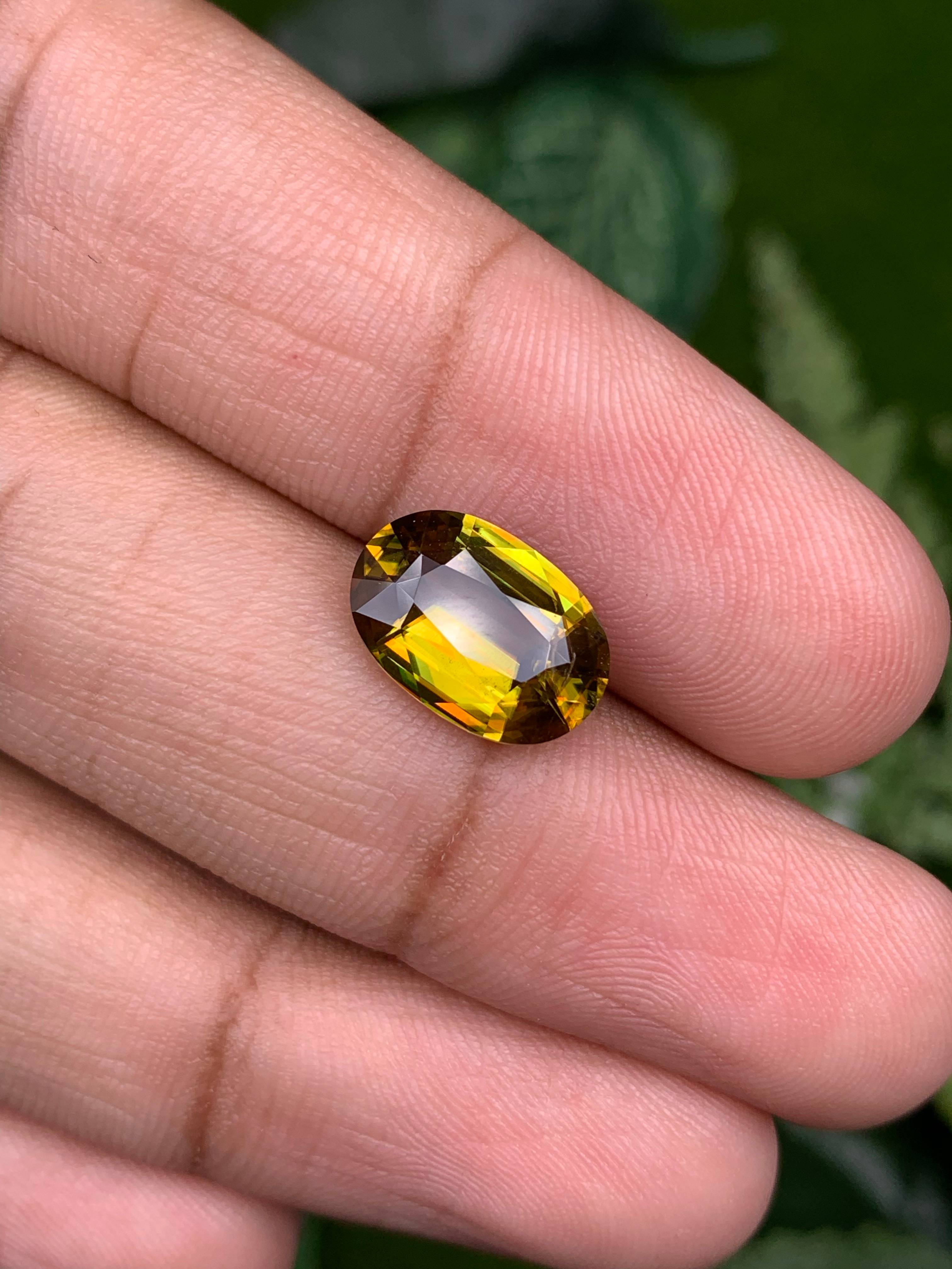 corn yellow sphene, 4.19ct oval cut — view 6
