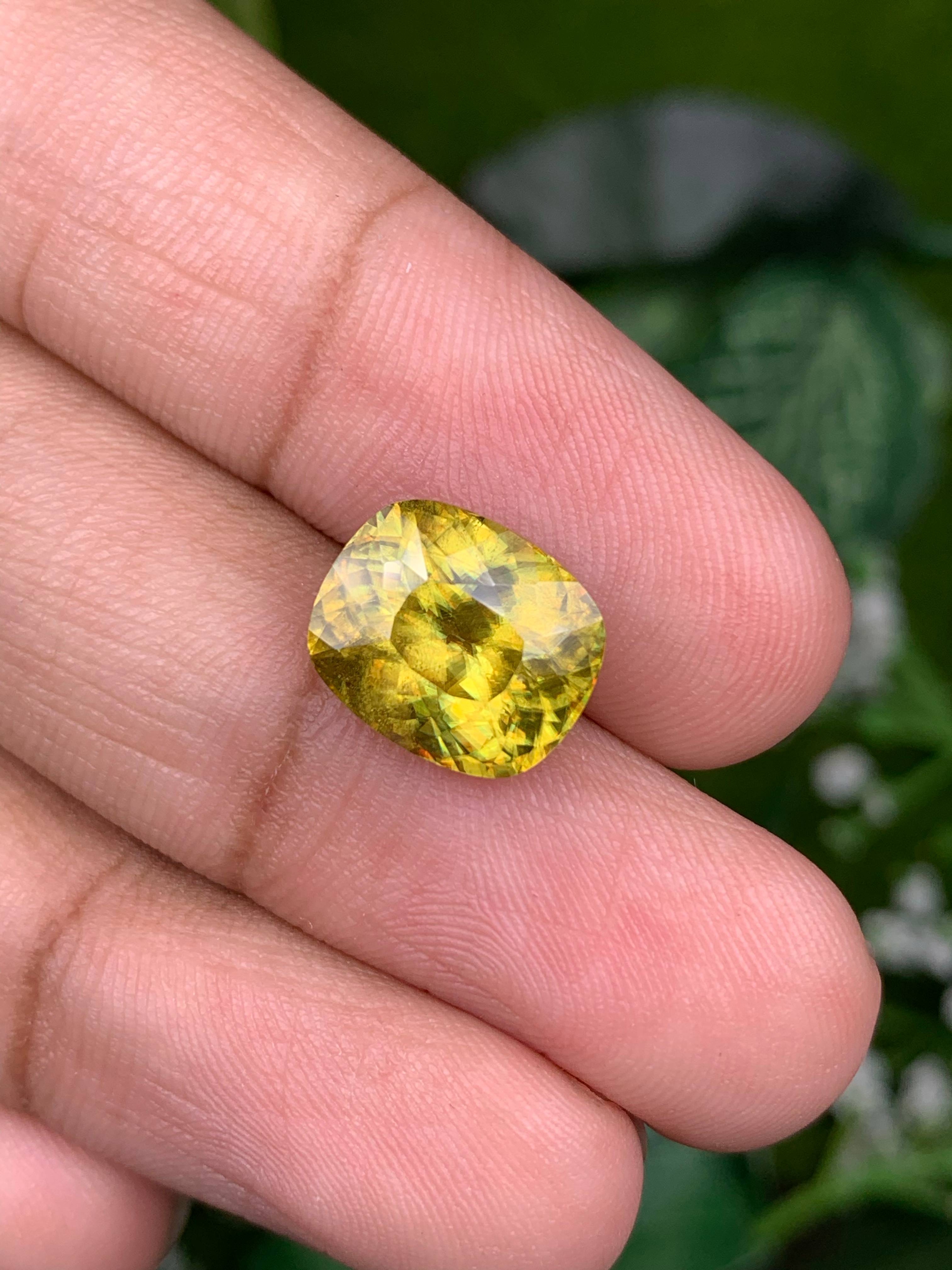 lime green sphene, 6.29ct cushion cut — view 5