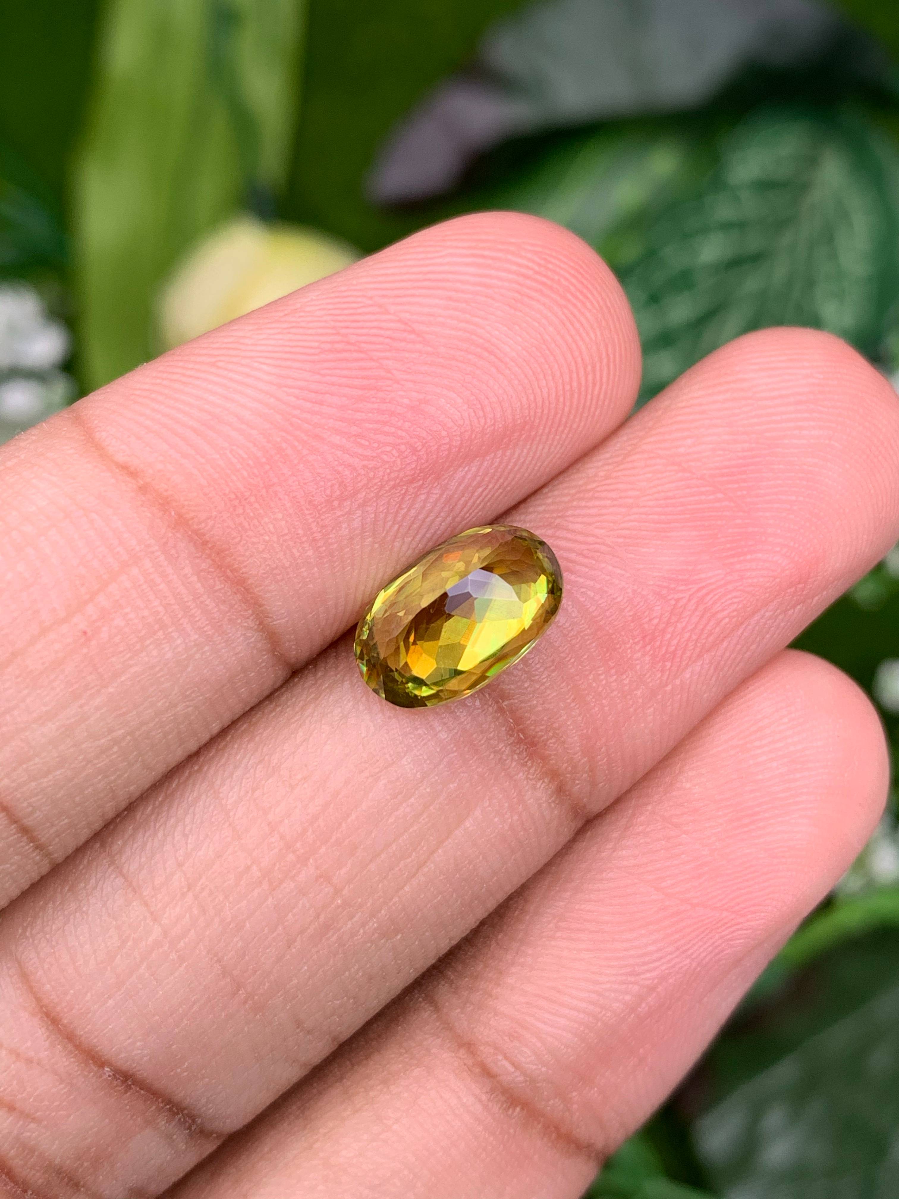forest green sphene, 2.93ct oval cut — view 7