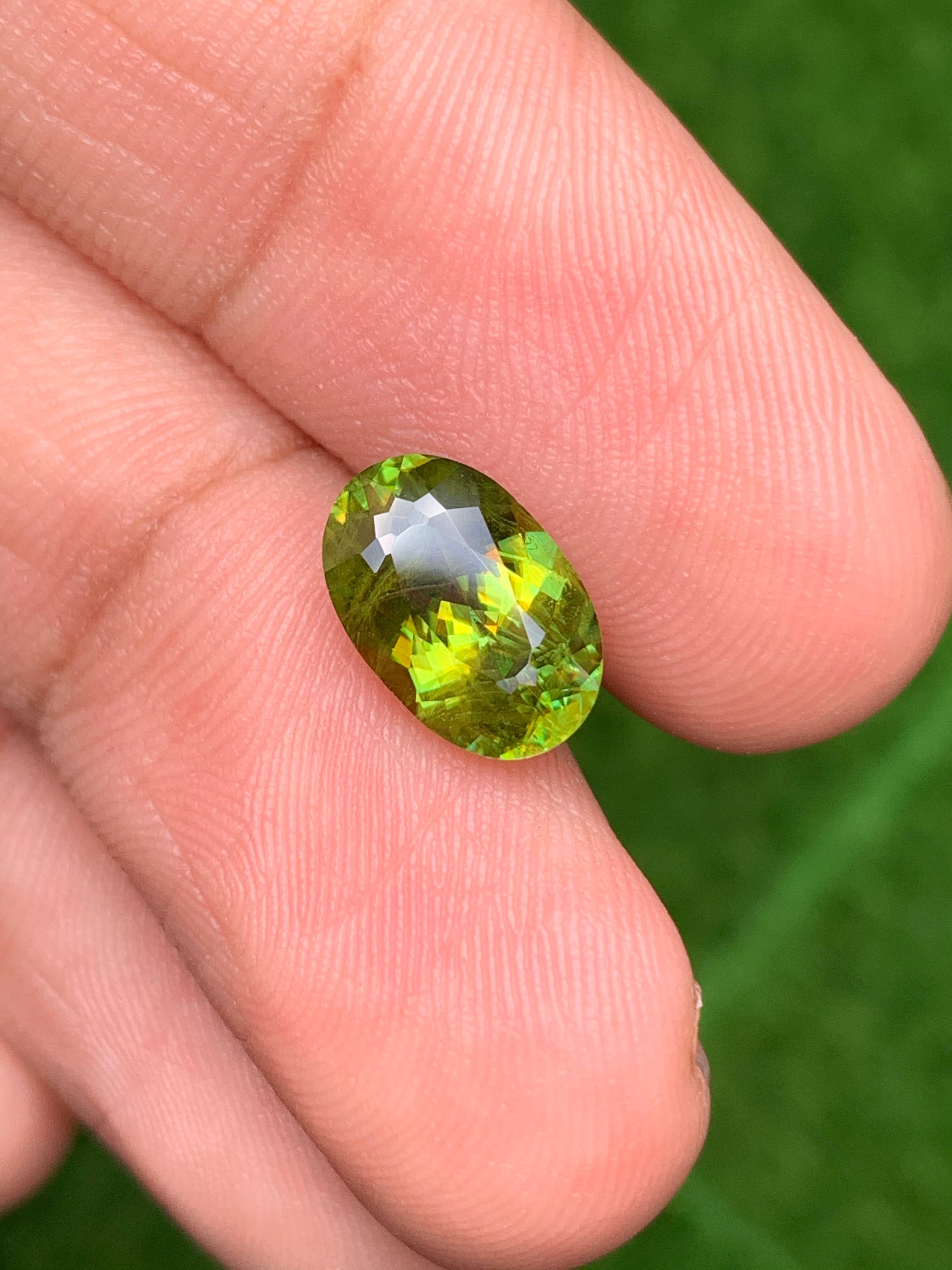 green sphene, 3.2ct oval cut — view 7