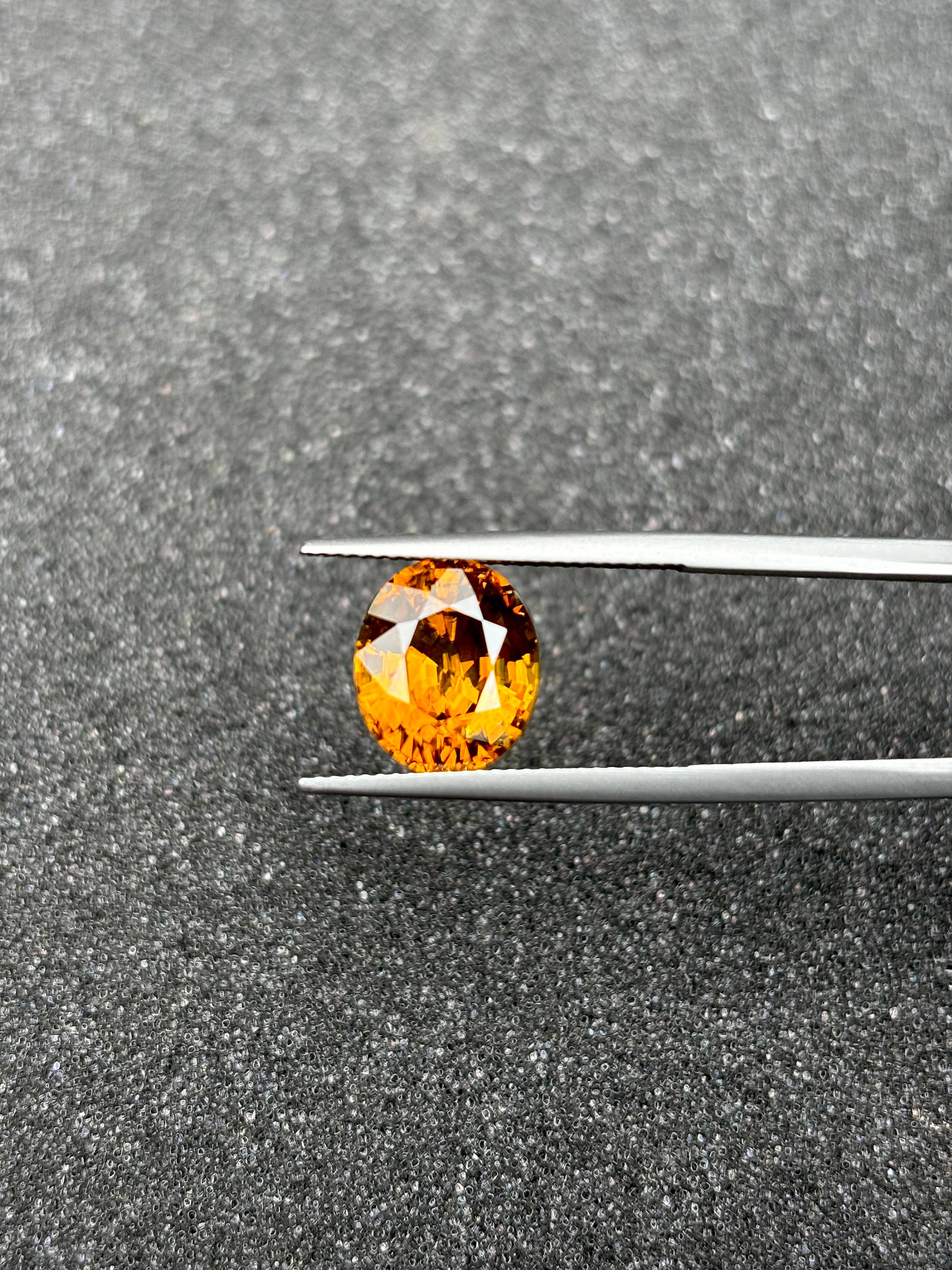 corn yellow sphene, 6.33ct oval cut — view 5