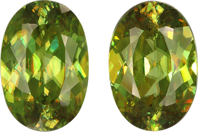 Oval cut sphene, 14.84 by 10.18 mm, shown at actual size
