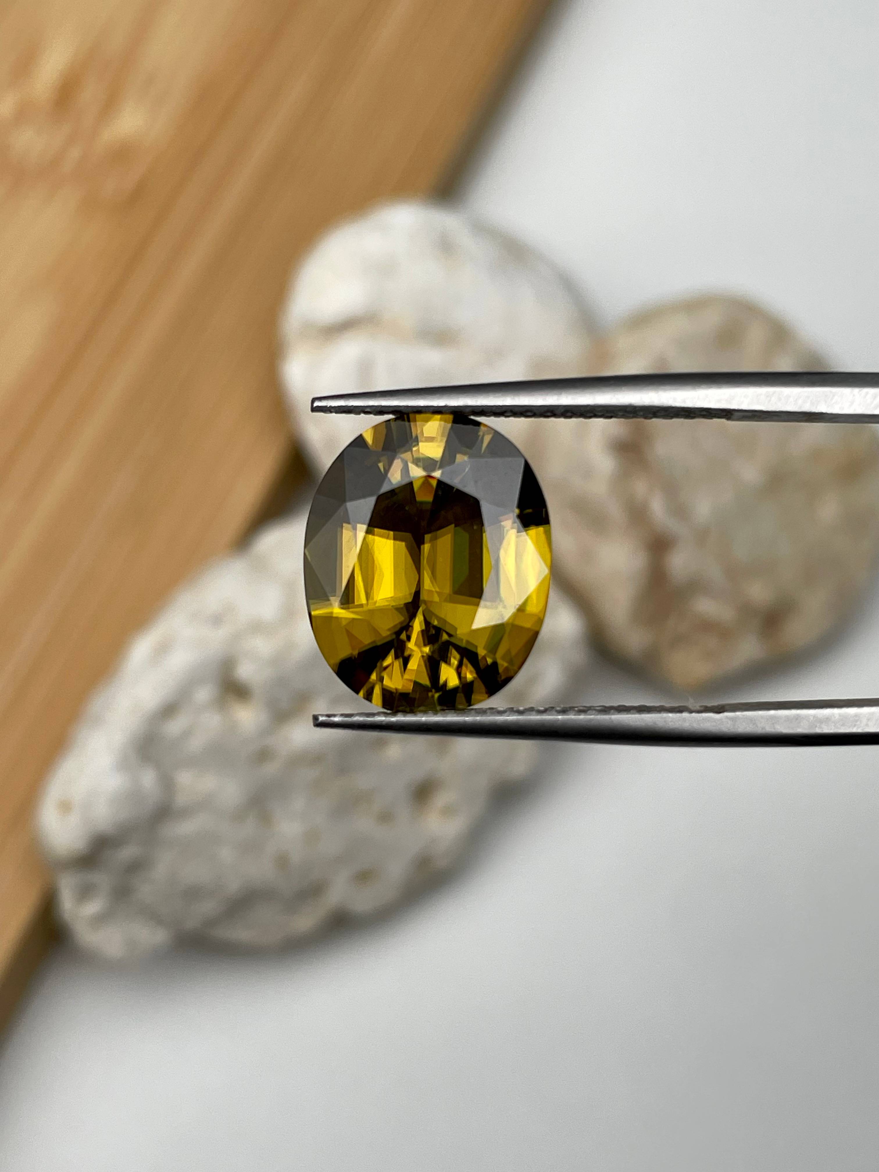 corn yellow sphene, 5.79ct oval cut — view 5
