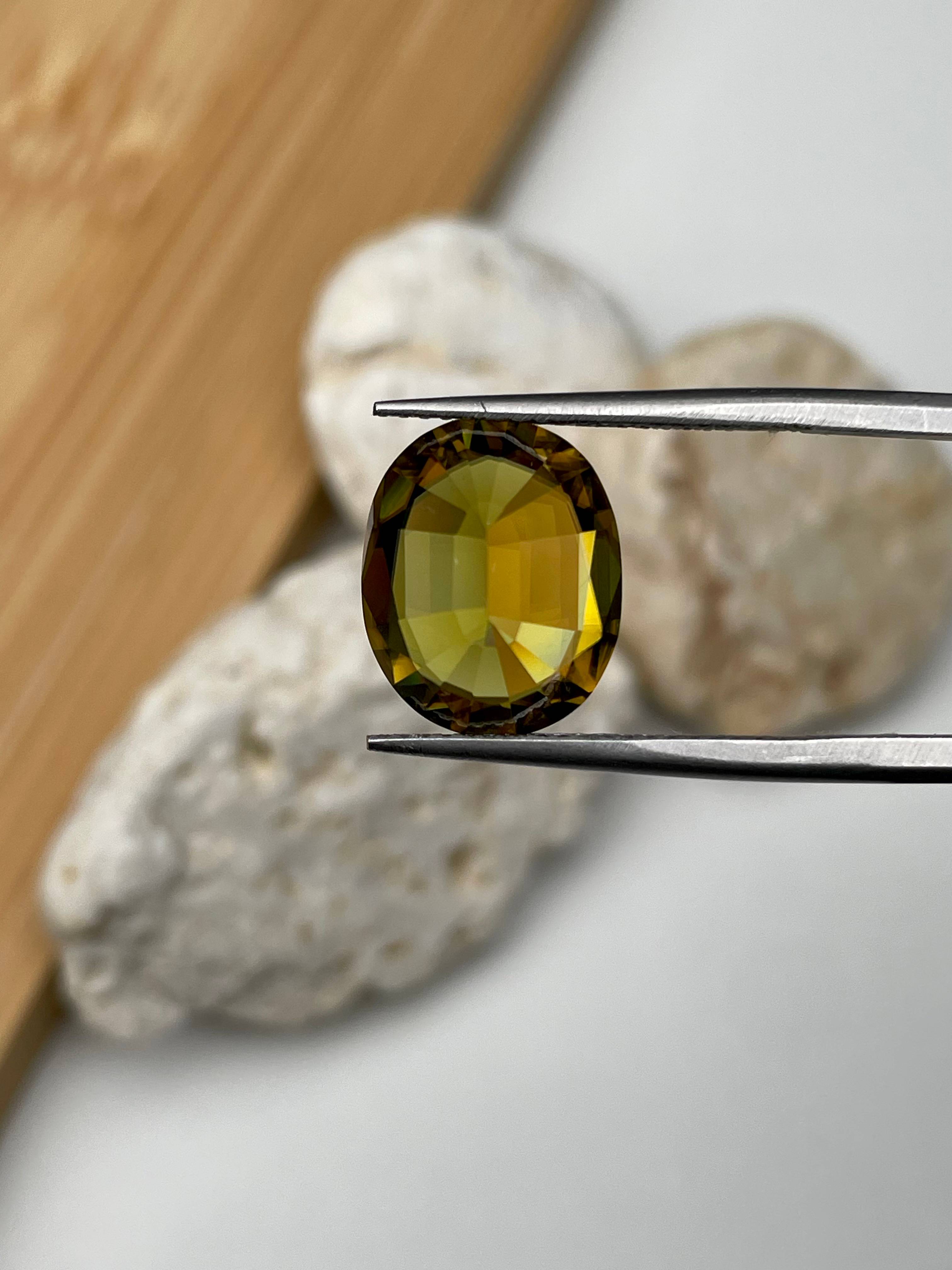 corn yellow sphene, 5.79ct oval cut — view 6